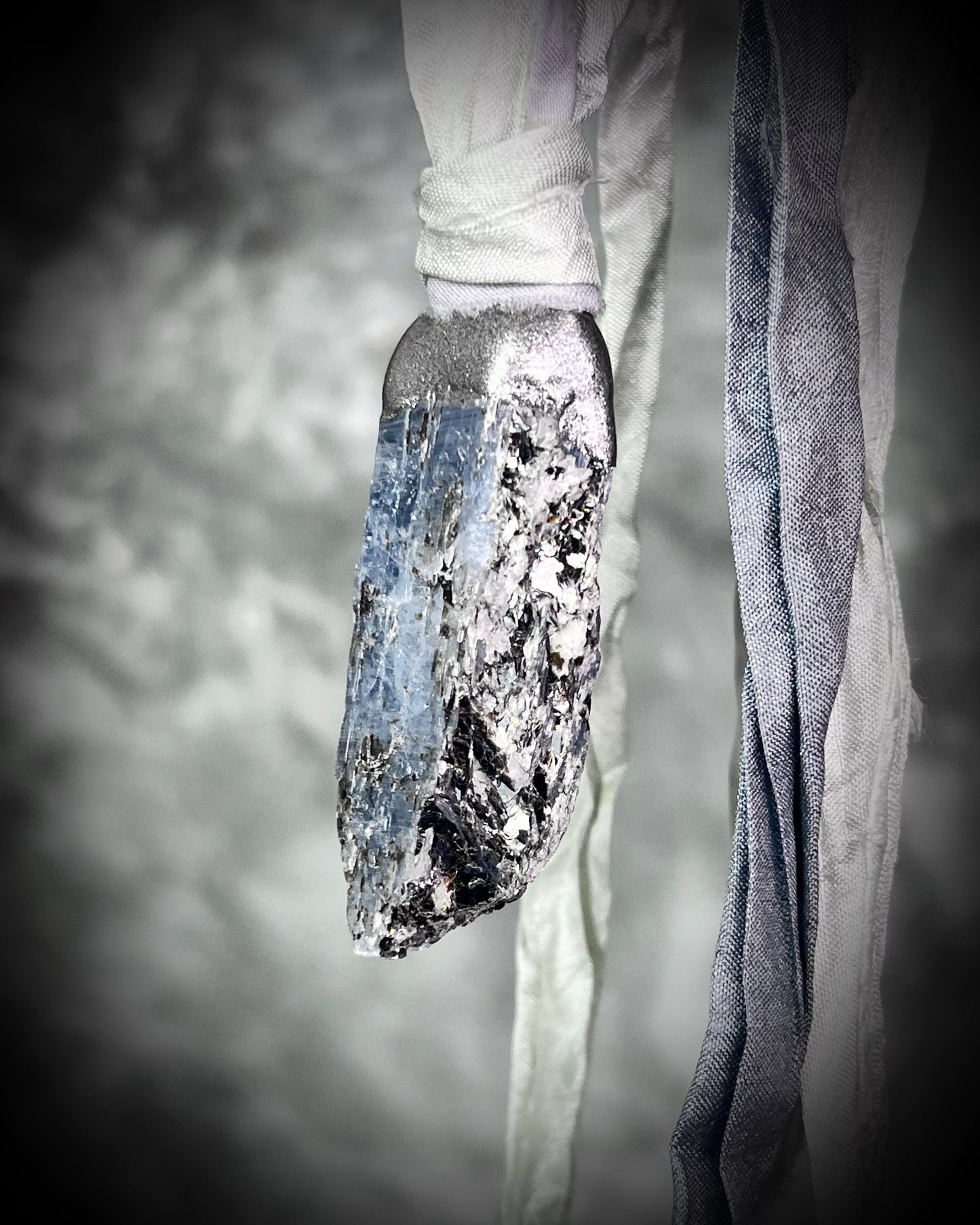 Blue Kyanite crystal healing throat chakra pendant on recycled silk for speaking your truth. Best travel jewelry for summer, sustainable festival jewelry or wedding necklace.