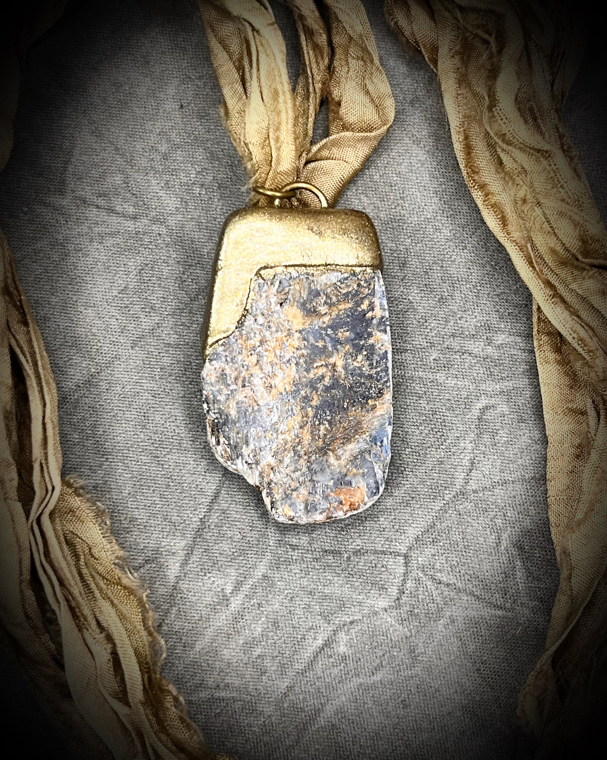 Ocean Blue Kyanite crystal healing throat chakra pendant on recycled silk for speaking your truth. Best travel jewelry for summer, sustainable festival jewelry or wedding necklace.