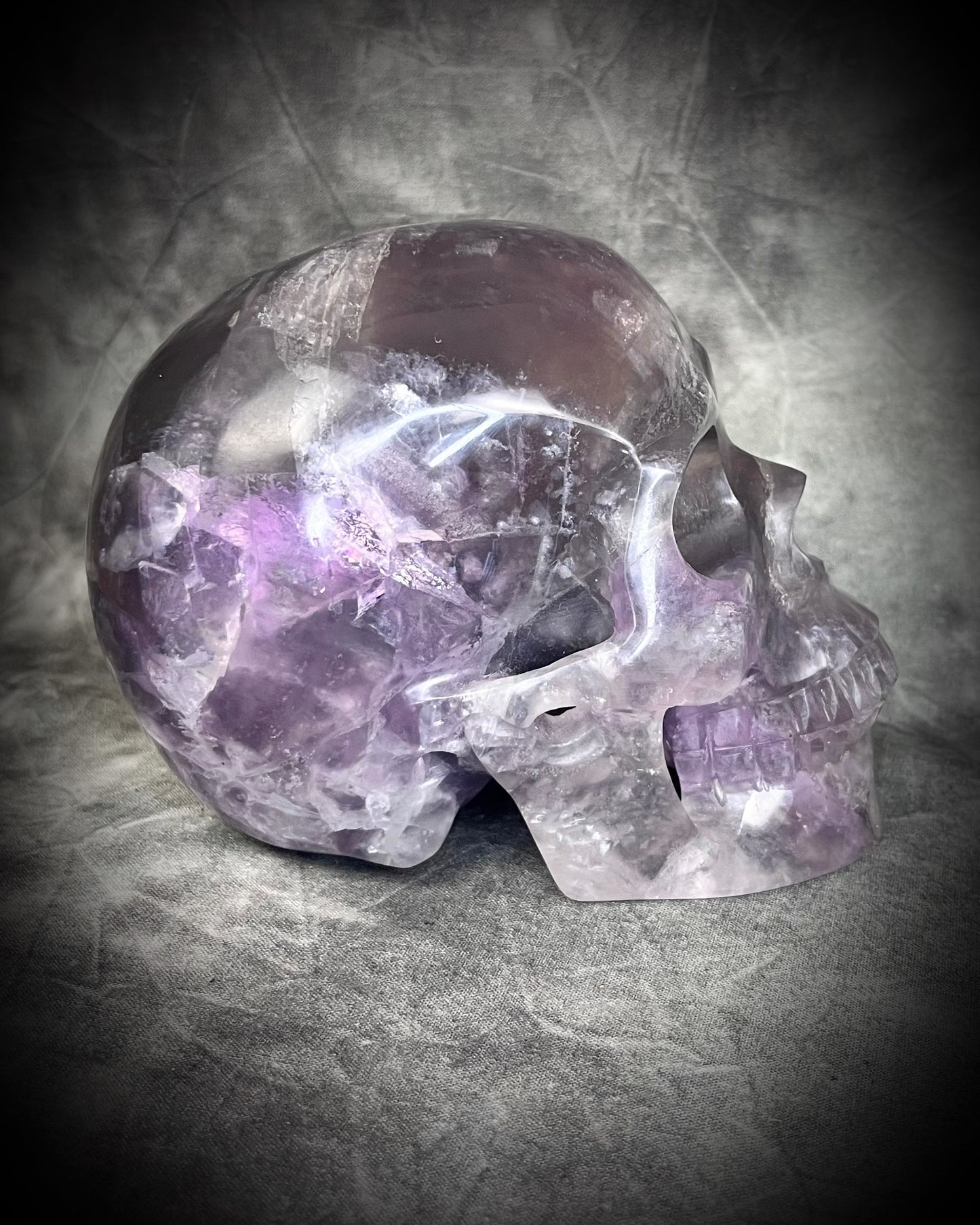 Purple Fluorite Crystal skull with shimmer and rainbows. 5" extra large crystal skull for holiday gifting, new year manifestation and magic.