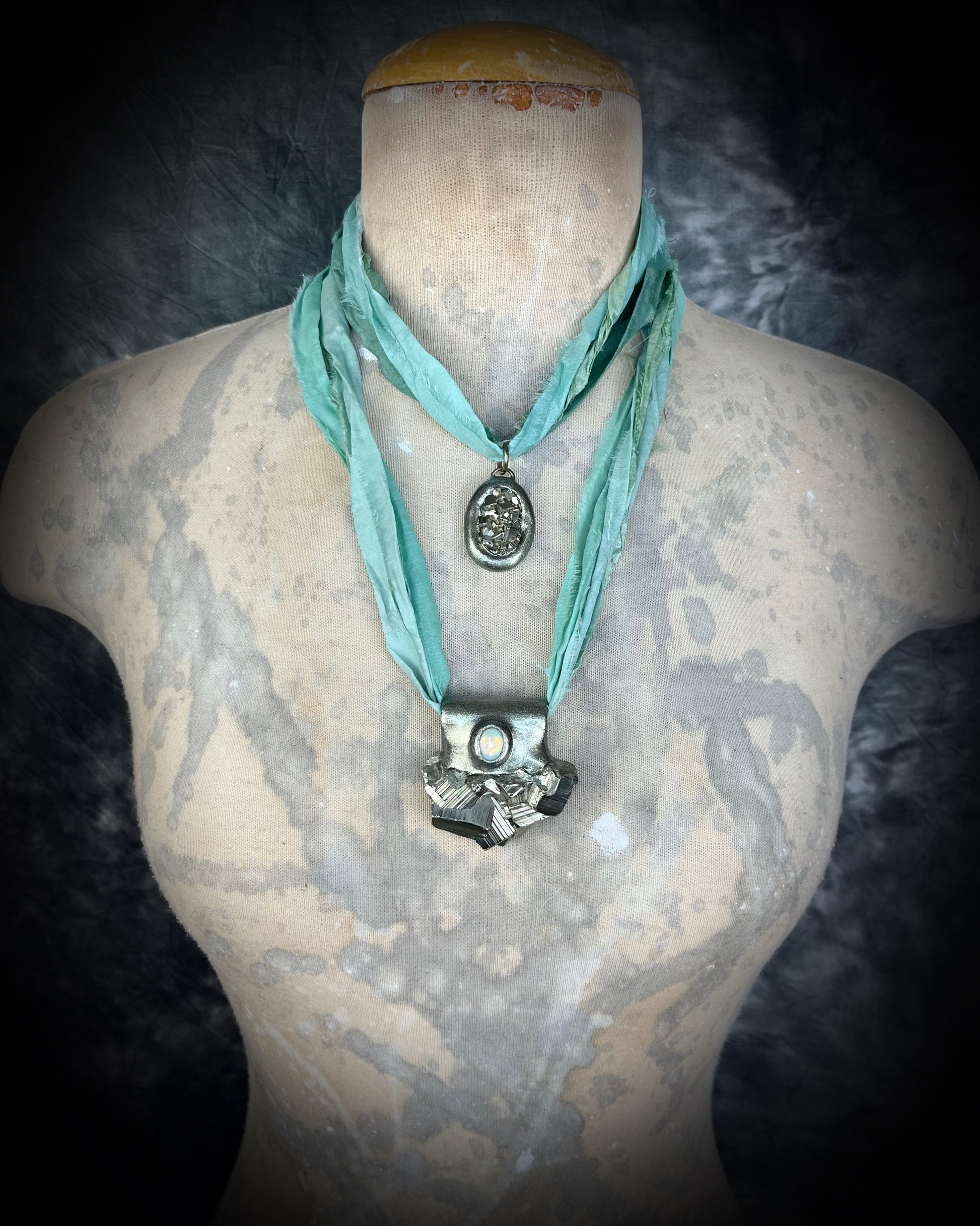 Pyrite crystal handmade necklace on aqua recycled silk for boho summer adventures and manifesting magic, best sustainable festival jewelry for summer adventures and eco-friendly parties