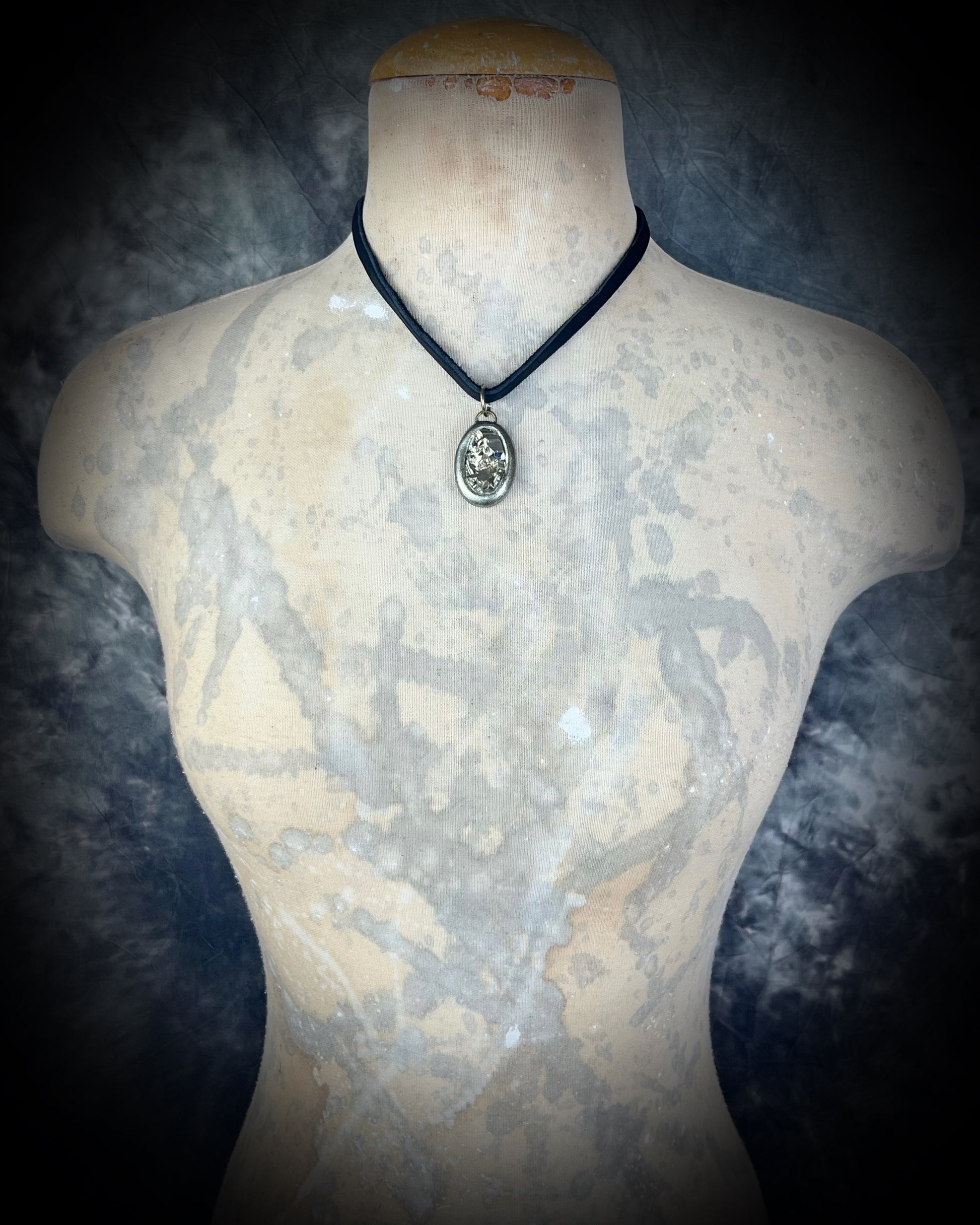 Pyrite handmade crystal pendants on black earthy leather. Manifestation talismans for holiday gifting, new year resolutions and everyday grounding and protection energy!