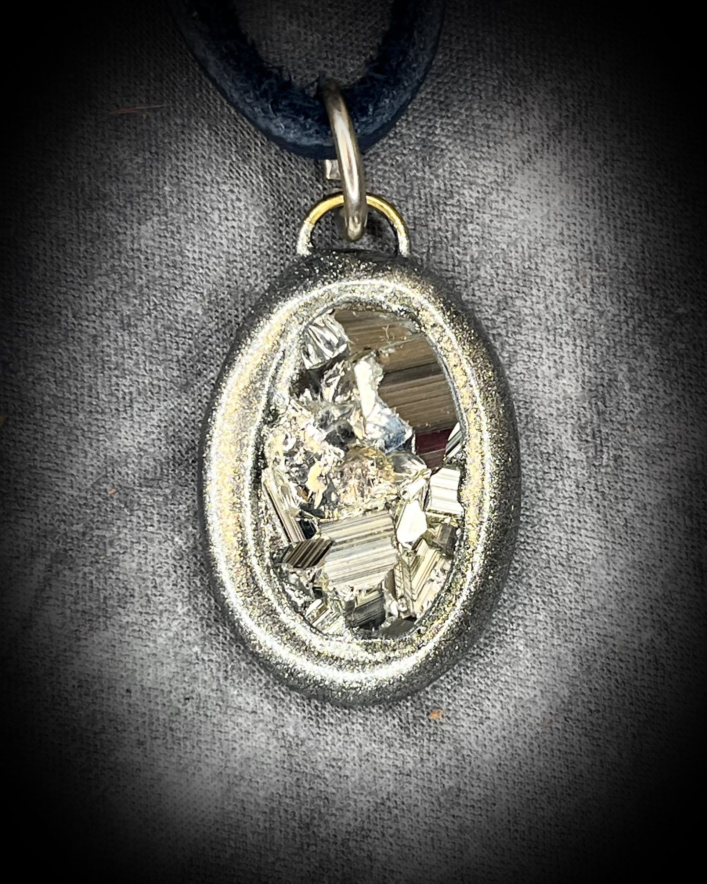 Pyrite handmade crystal pendants on black leather. Manifestation talismans for holiday gifting, new year resolutions and everyday grounding and protection energy!