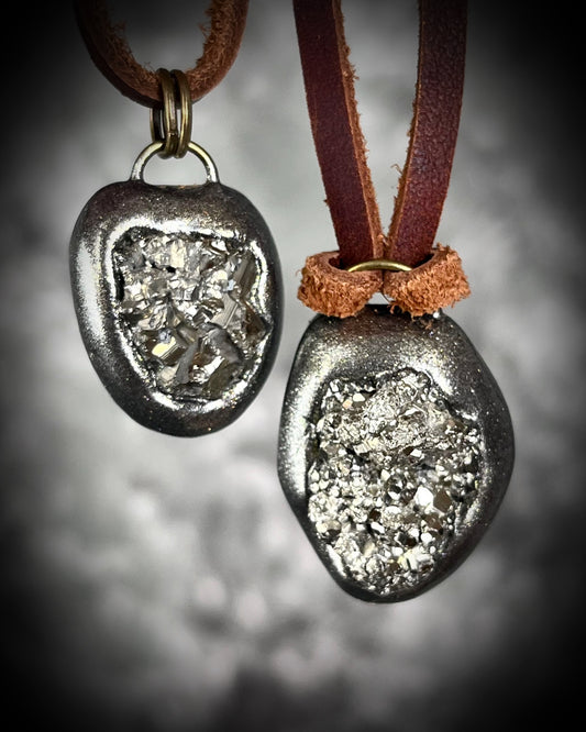 Pyrite handmade crystal pendants on brown earthy leather. Manifestation talismans for holiday gifting, new year resolutions and everyday grounding and protection energy!