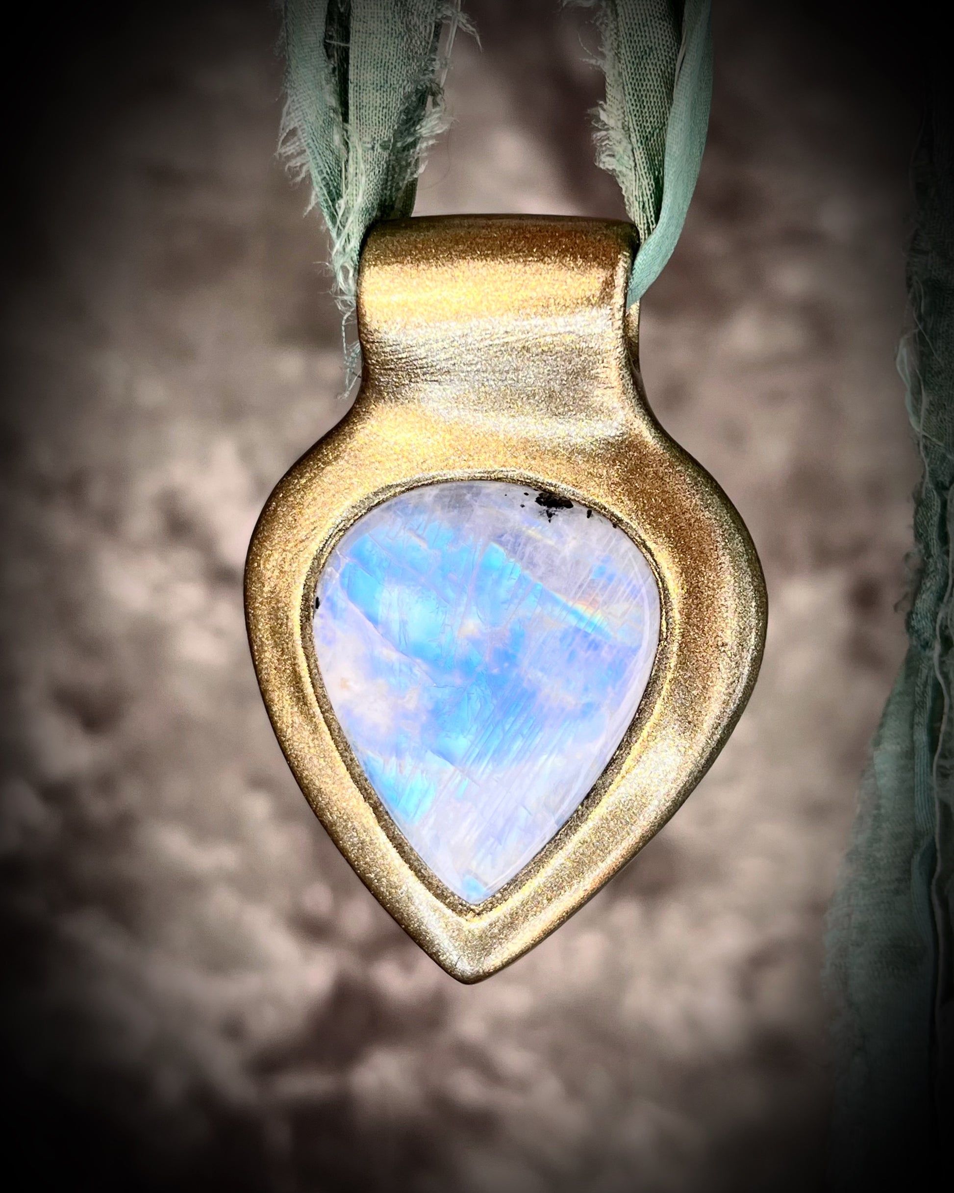 Dreamy handmade rainbow moonstone sculptural necklace in gold, hung from aqua recycled silk for an ethereal boho elegance.  Perfect for summer travel, mothers day gifting, bridal shower gift or everyday magic!