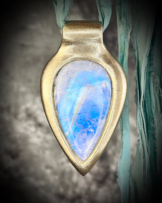 Handmade in the USA sculptural one of a kind statement, maximalist Rainbow Moonstone Necklace.  Goddess inspired and hung from recycled silk for a modern eco-friendly gift!