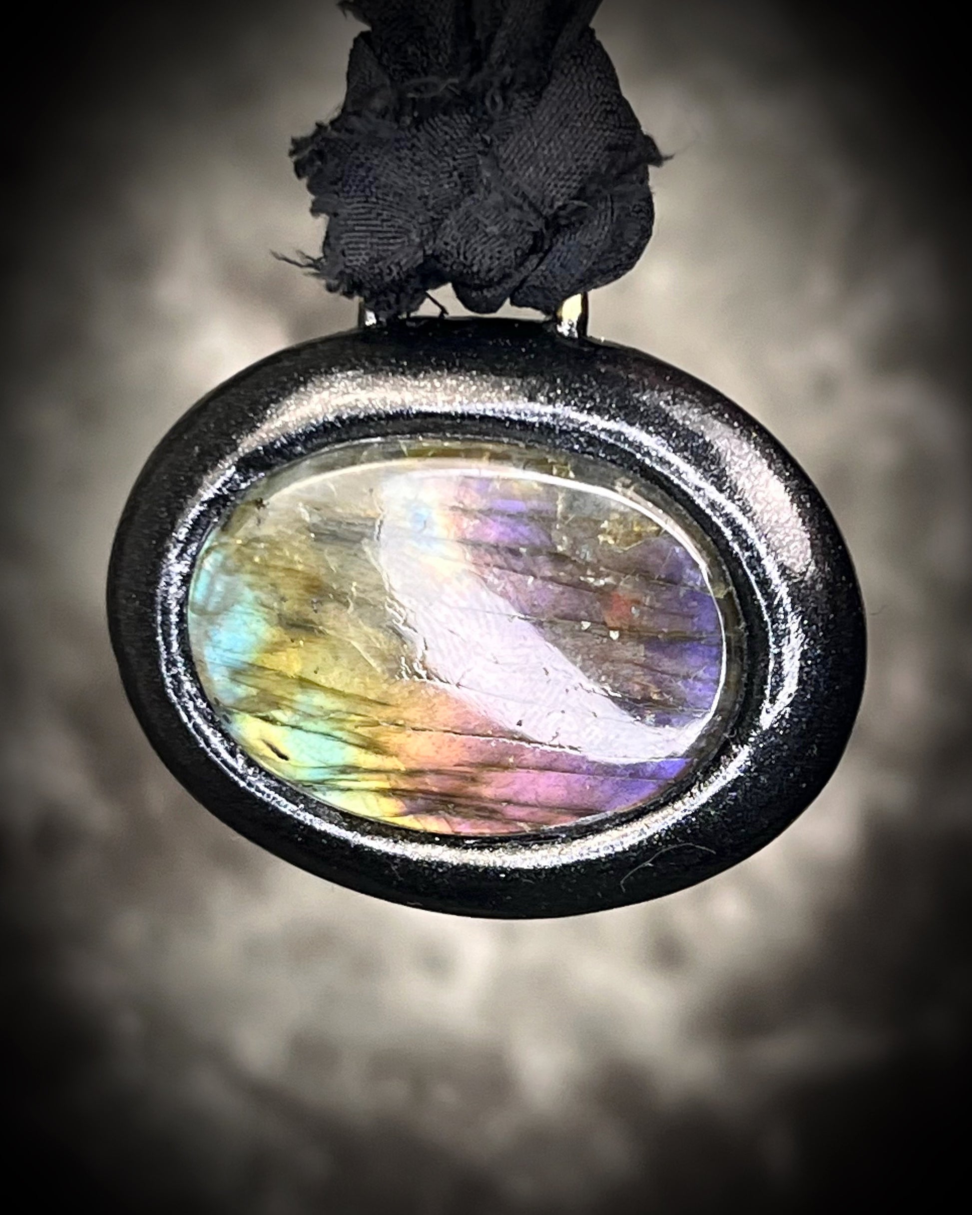 Rainbow labradorite pendant necklace in black frame on recycled silk, statement crystal talisman jewelry for intuition, handmade in Baltimore Maryland