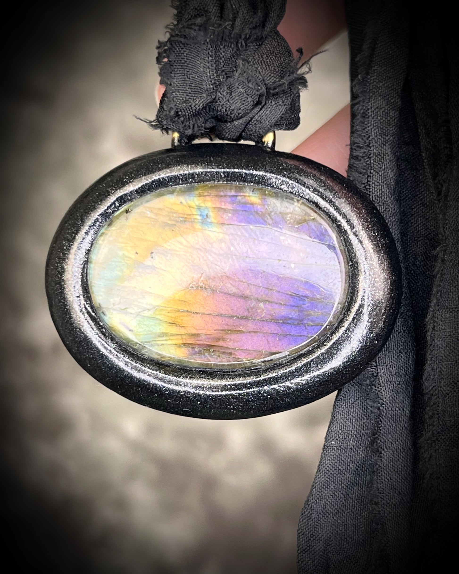 Rainbow labradorite pendant necklace in black frame on recycled silk, statement crystal talisman jewelry for intuition, handmade in Baltimore Maryland