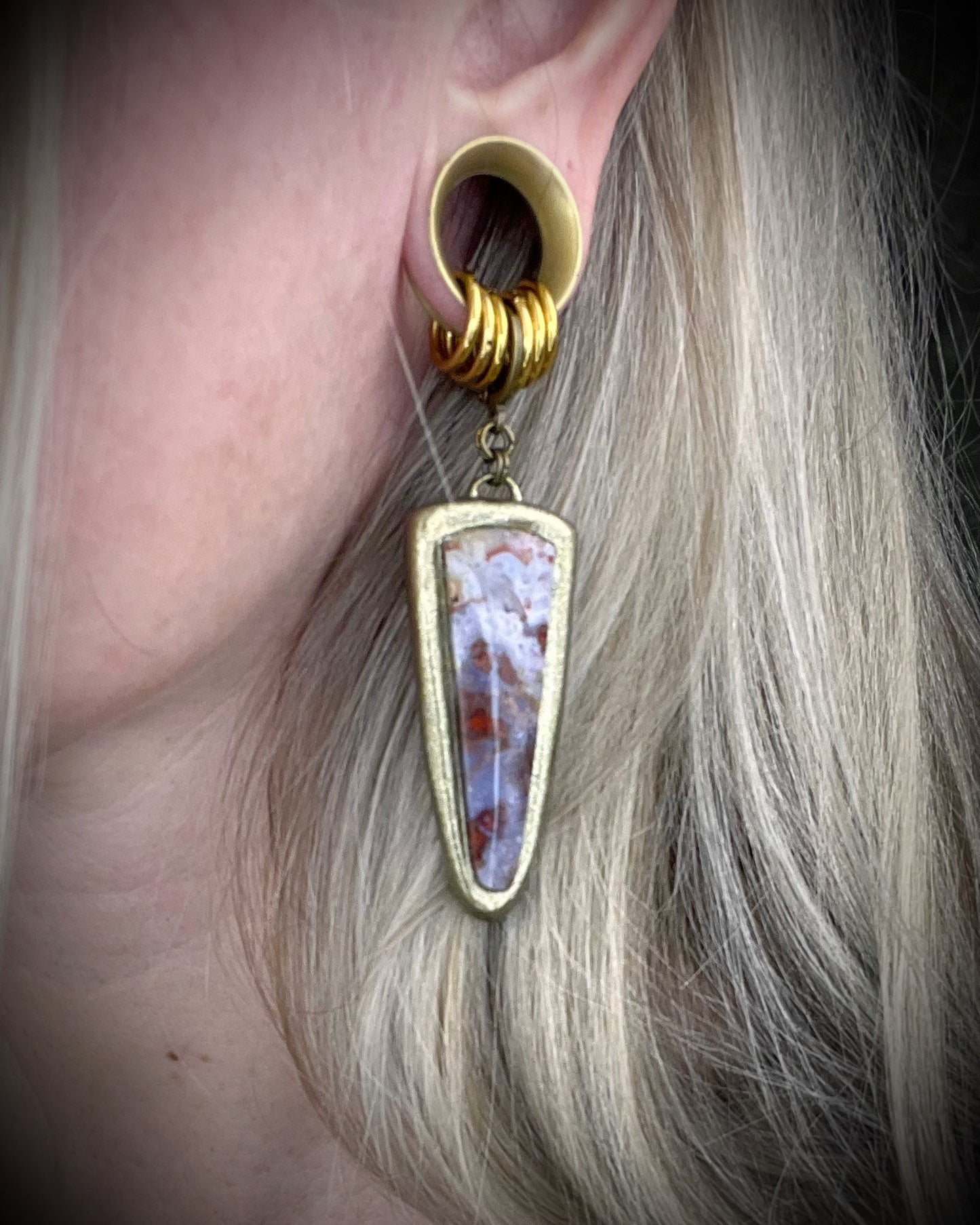 Red moss agate earrings in rich red and lilac colors with hypoallergenic brass huggie hooks in a gold tone, statement gemstone jewelry handmade in Baltimore Maryland. 