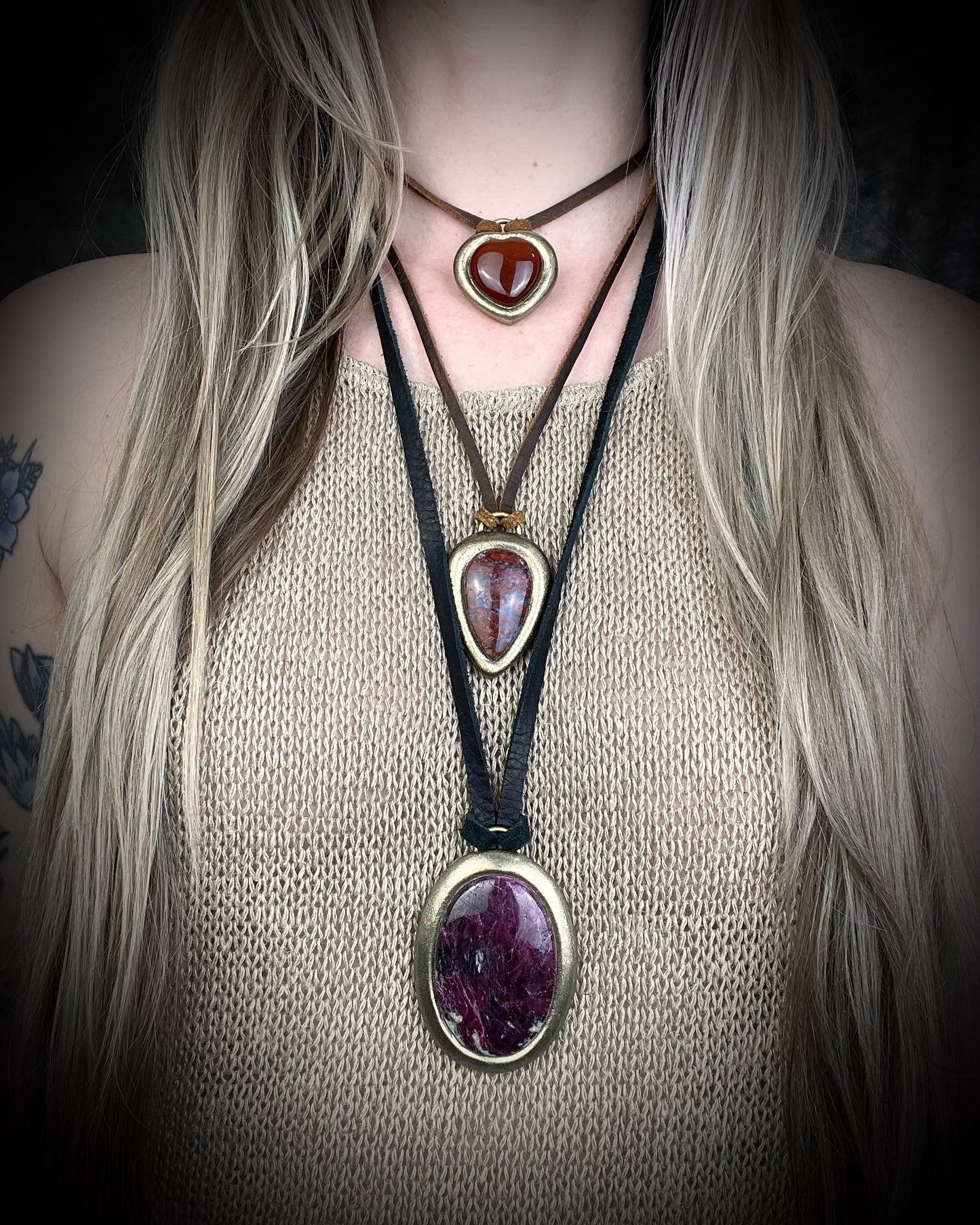 Red moss agate pendant in a gold finish, handmade and hung from brown earthy leather. Empowering and manifestation talisman for 2026 year of the fire horse. 