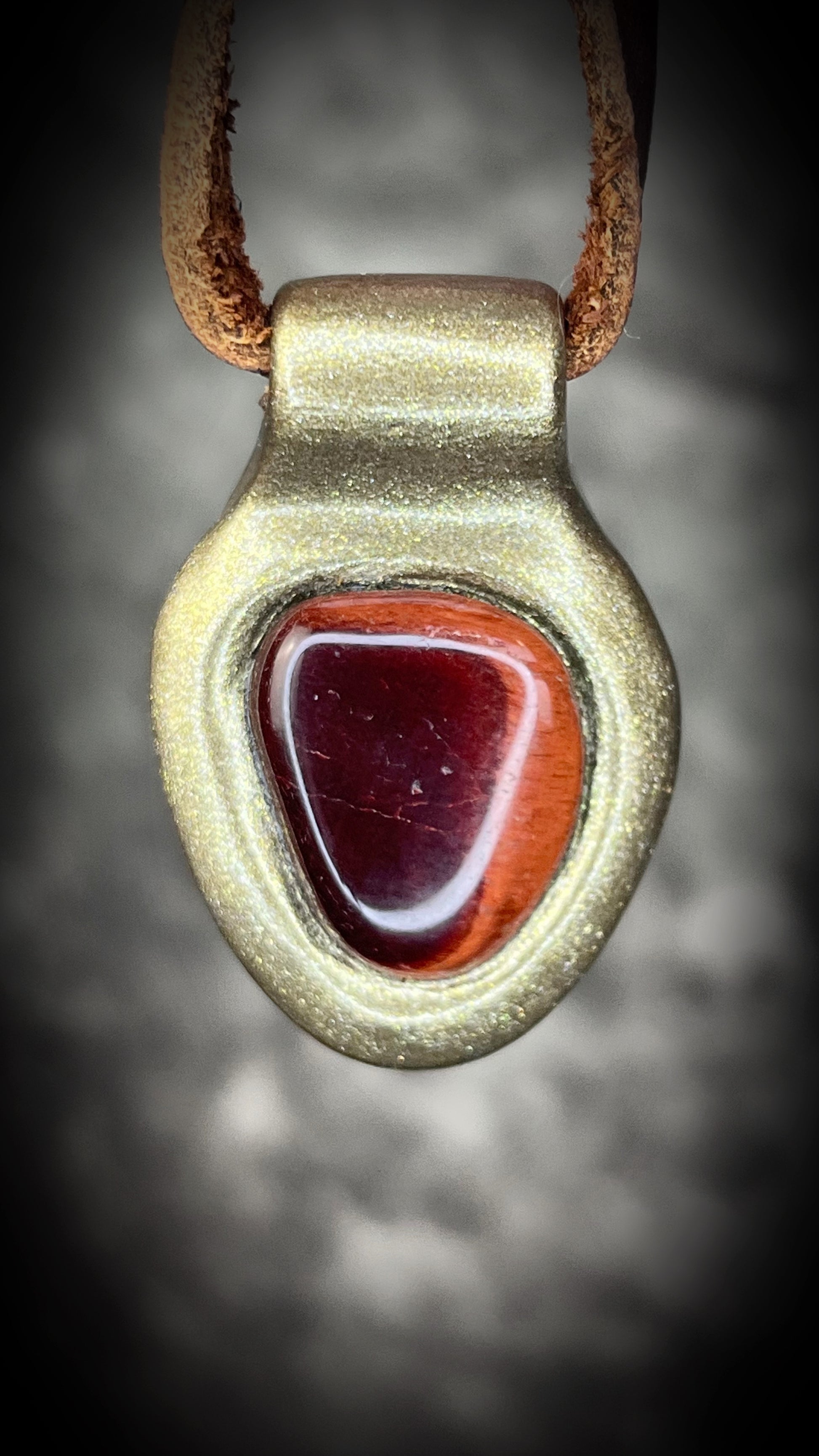 Red tigers eye holiday gift pendant. Handmade crystal talisman for courage and passion.