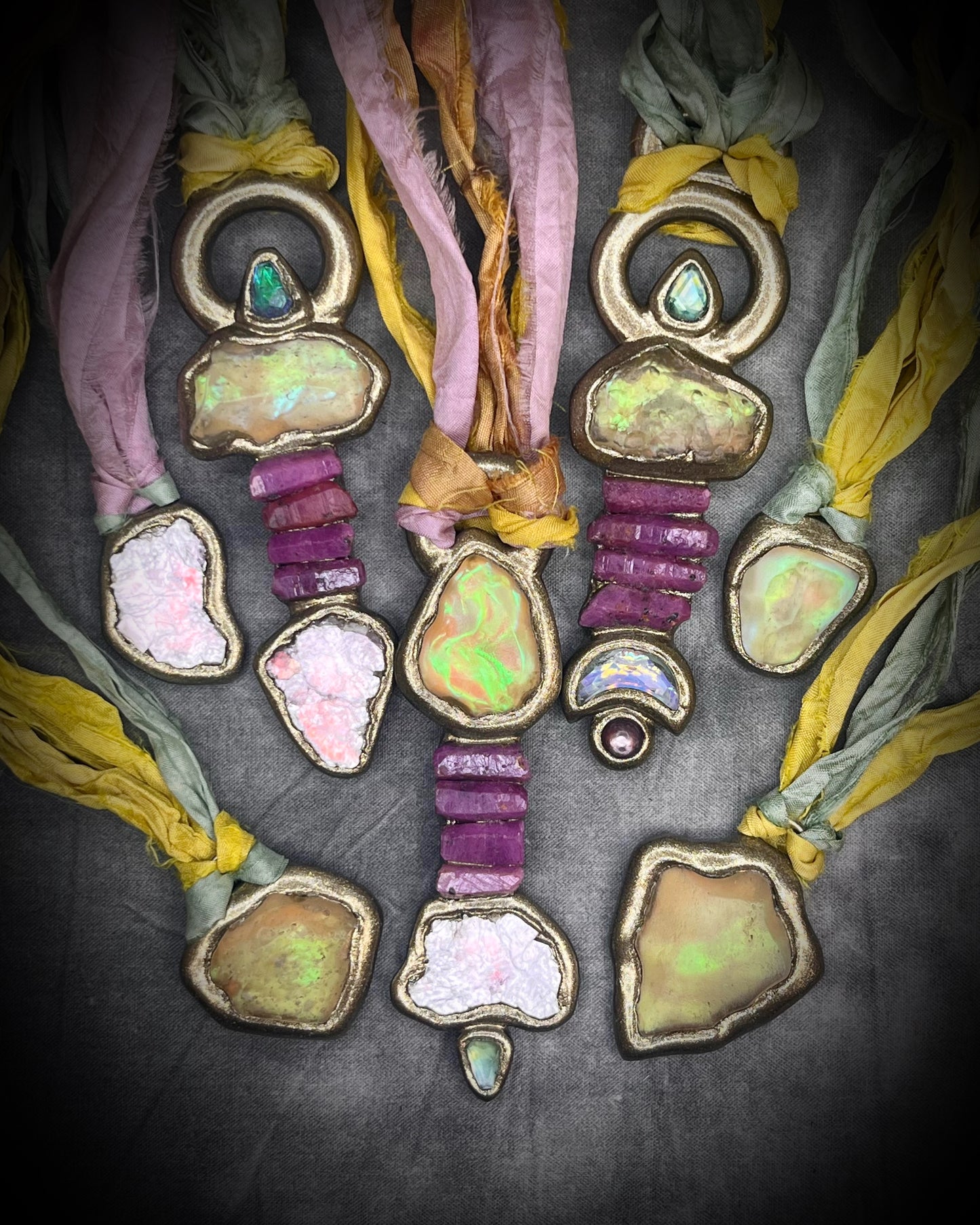 STARBORN collection by Become Spellbound. Handmade jewelry featuring libyan desert glass, rubies and green tourmaline gemstones.