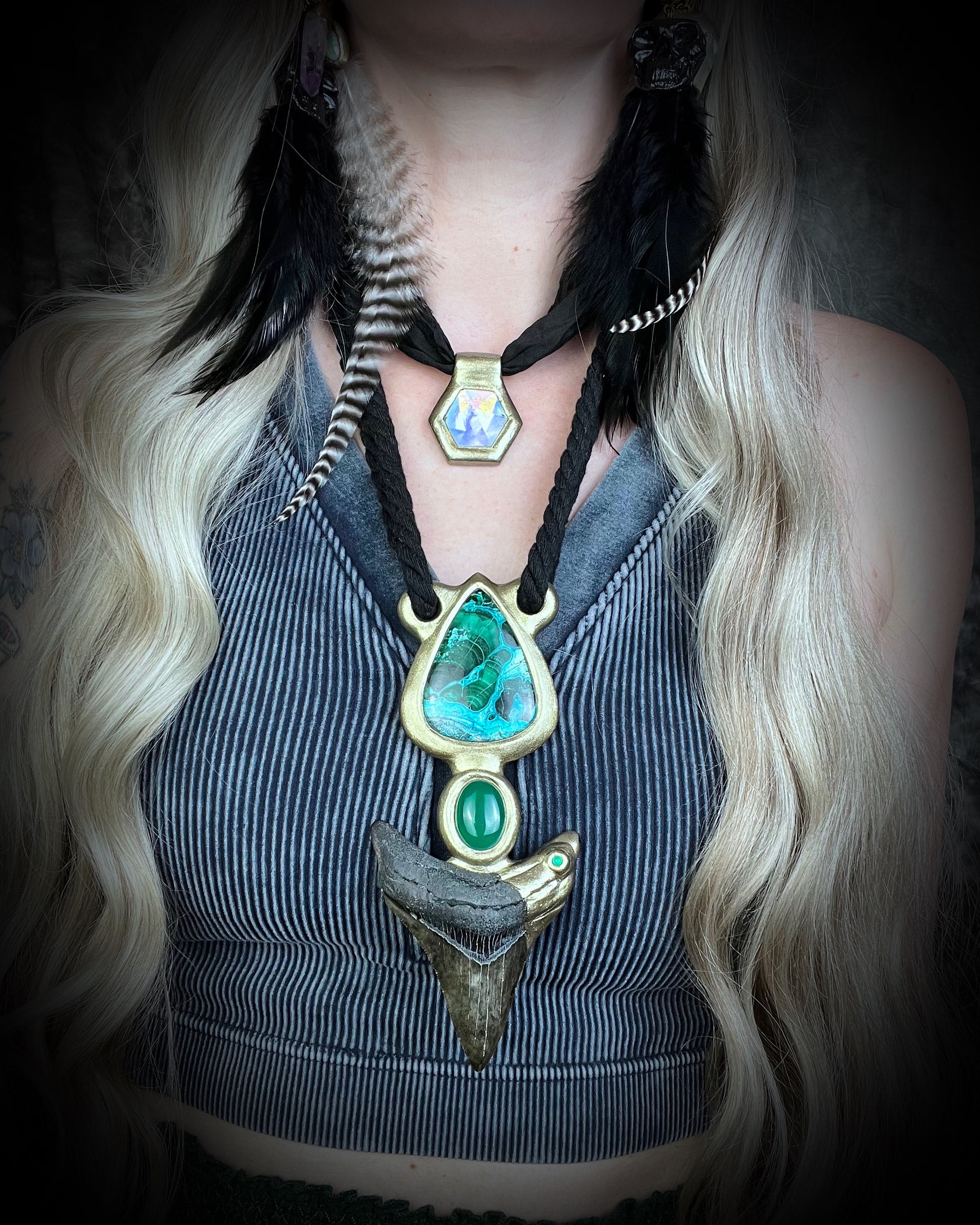 Scorpio gemstone birthstone necklace in gold finish on black leather. Opalescent quartz talisman for Scorpio or scorpion lovers. Here worn by a model