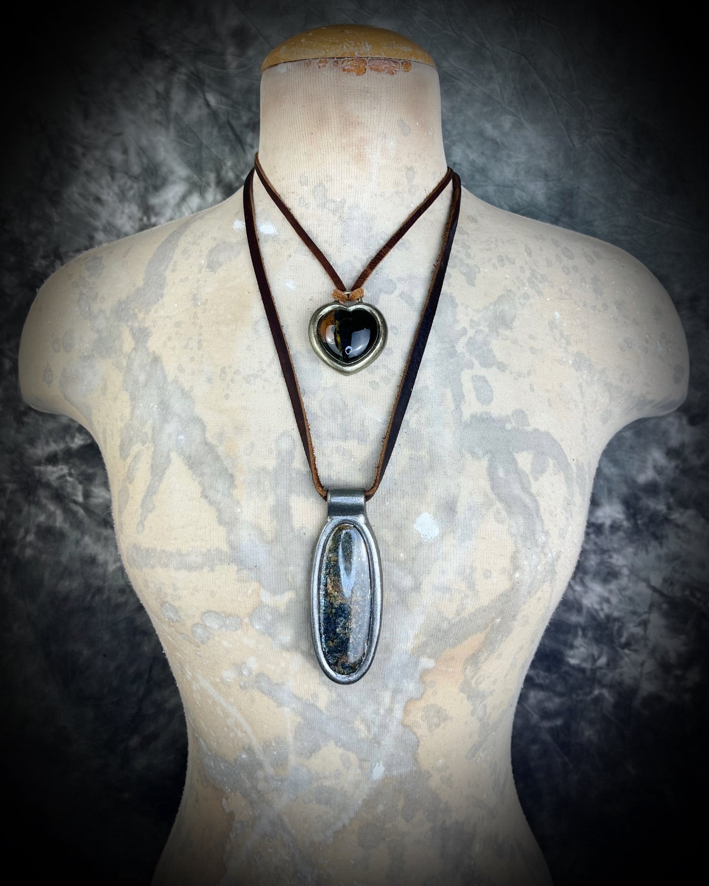 Shimmering moss kyanite crystal healing talisman in dark silver finish hung from soft and rugged brown leather. Gift intuition, transformation and communication.