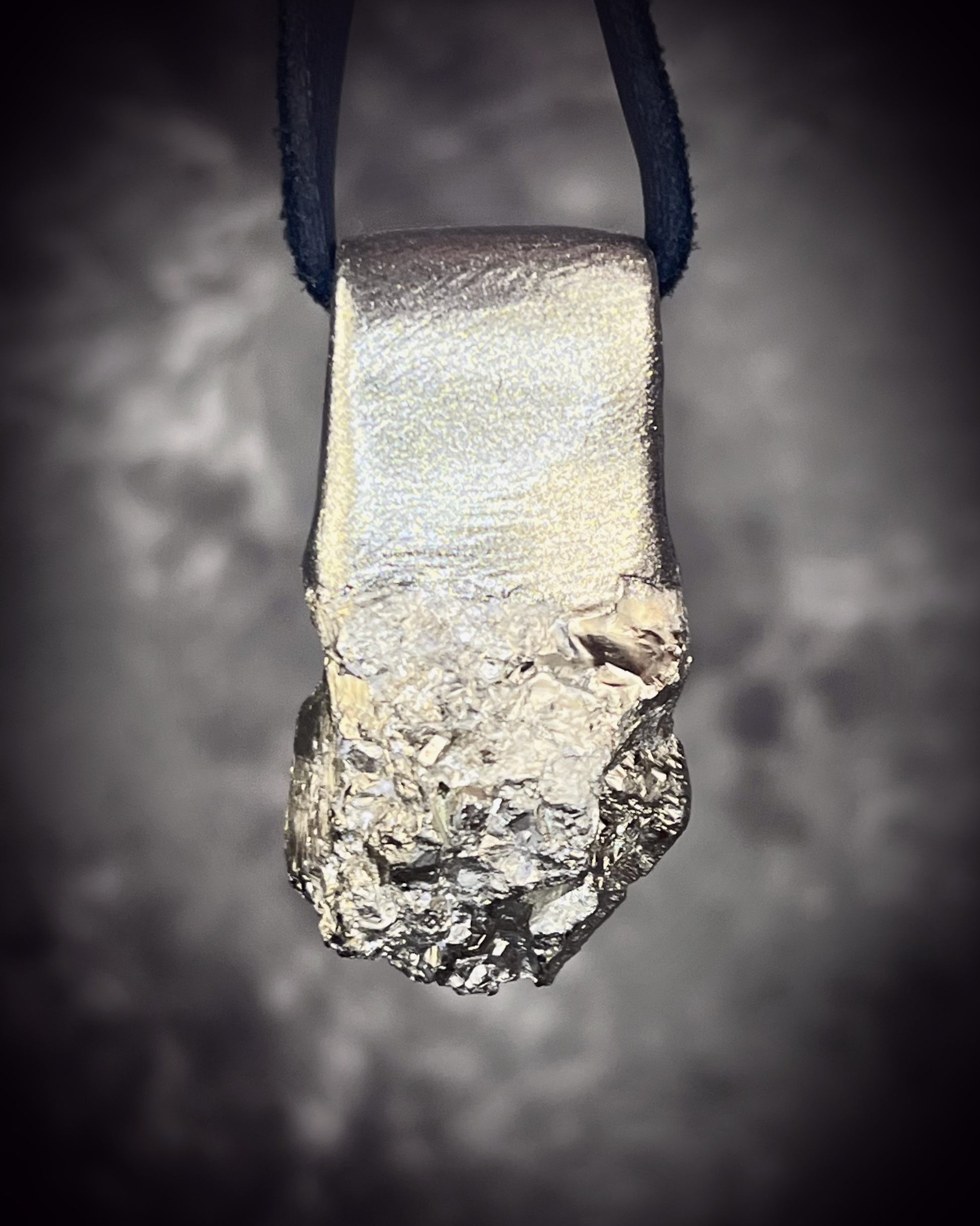 Sparkling Peruvian pyrite talisman with natural cubic formations on brown leather, handmade by Become Spellbound in Baltimore, Maryland.