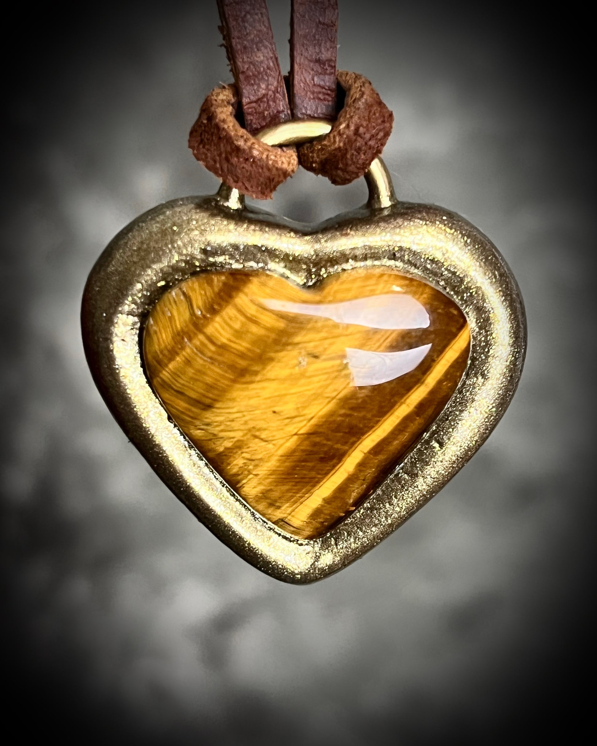 Tiger’s Eye crystal heart pendant necklaces with gold finish on brown leather cord — handmade grounding and protective jewelry. Holiday gift for her.
