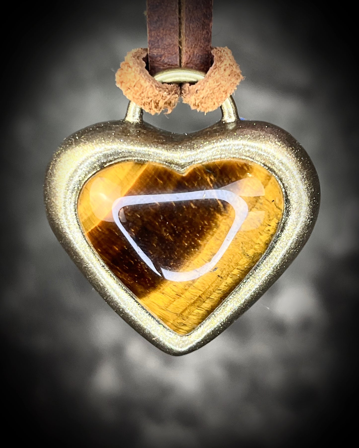 Tiger’s Eye crystal heart pendant necklaces with gold finish on brown leather cord — handmade grounding and protective jewelry. Holiday gift for her.