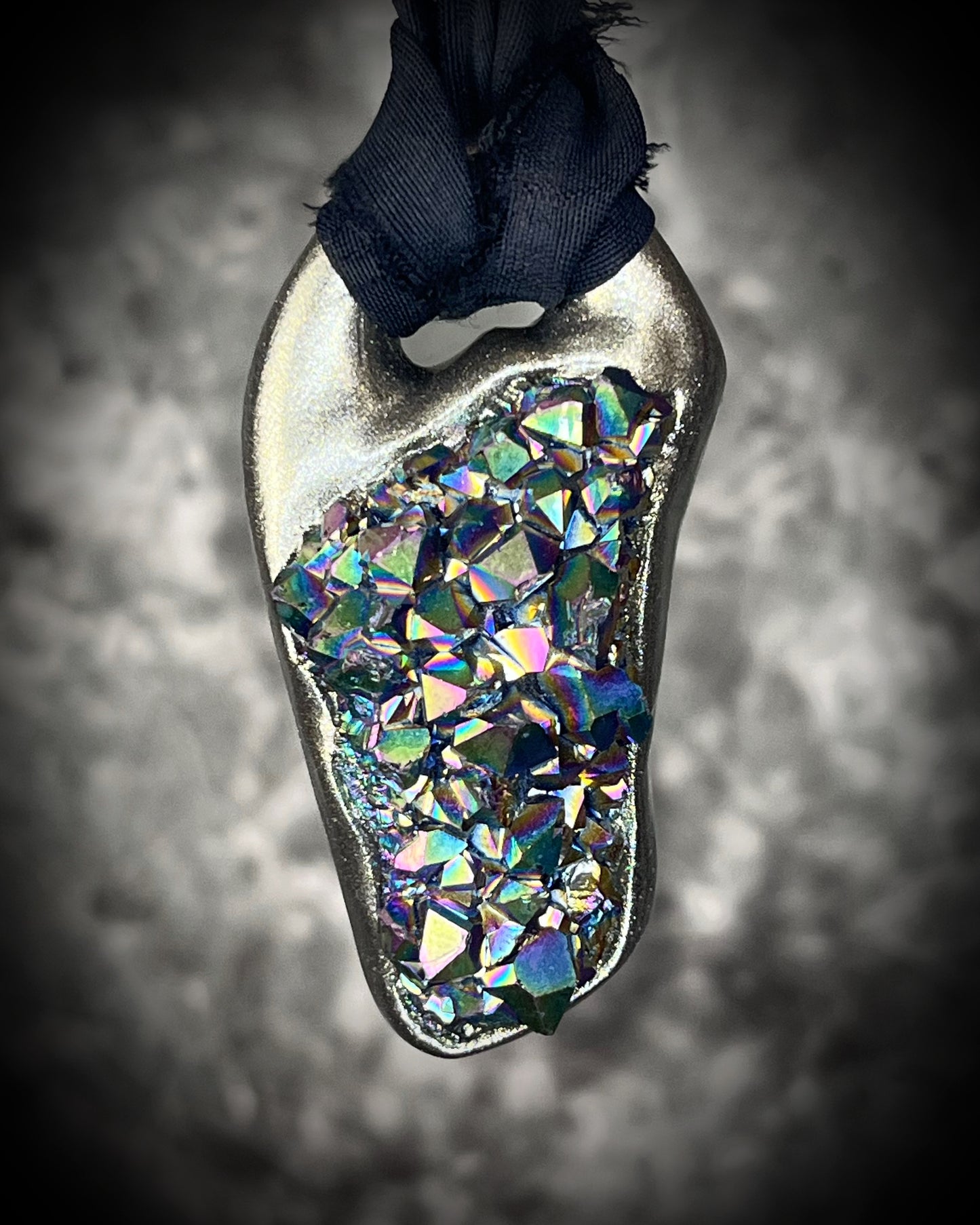 Titanium aura Amethyst pendant with iridescent gemstone druzy sparkle, handmade and hung from black recycled silk for an elegant holiday gift for her.