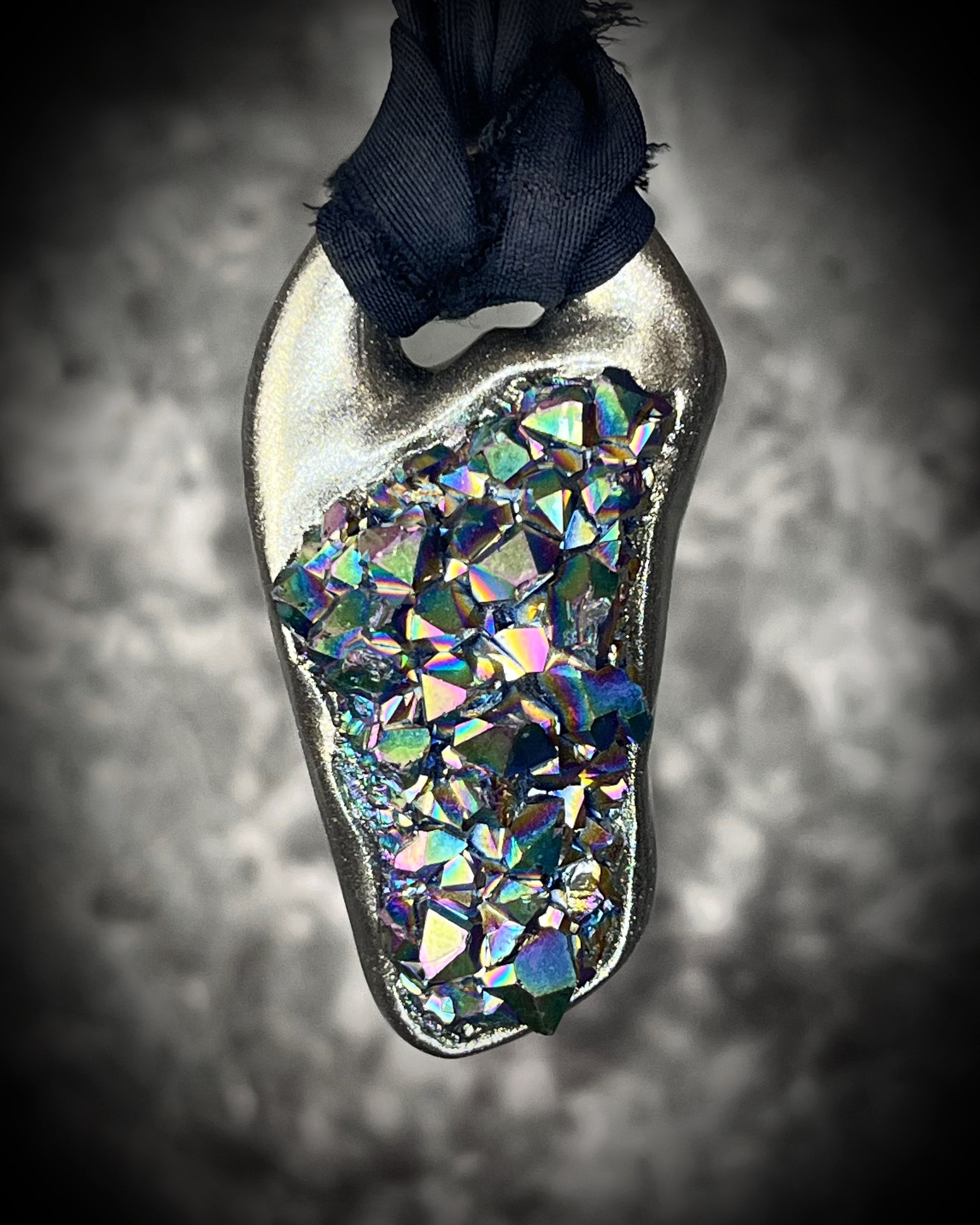 Titanium aura Amethyst pendant with iridescent gemstone druzy sparkle, handmade and hung from black recycled silk for an elegant holiday gift for her.