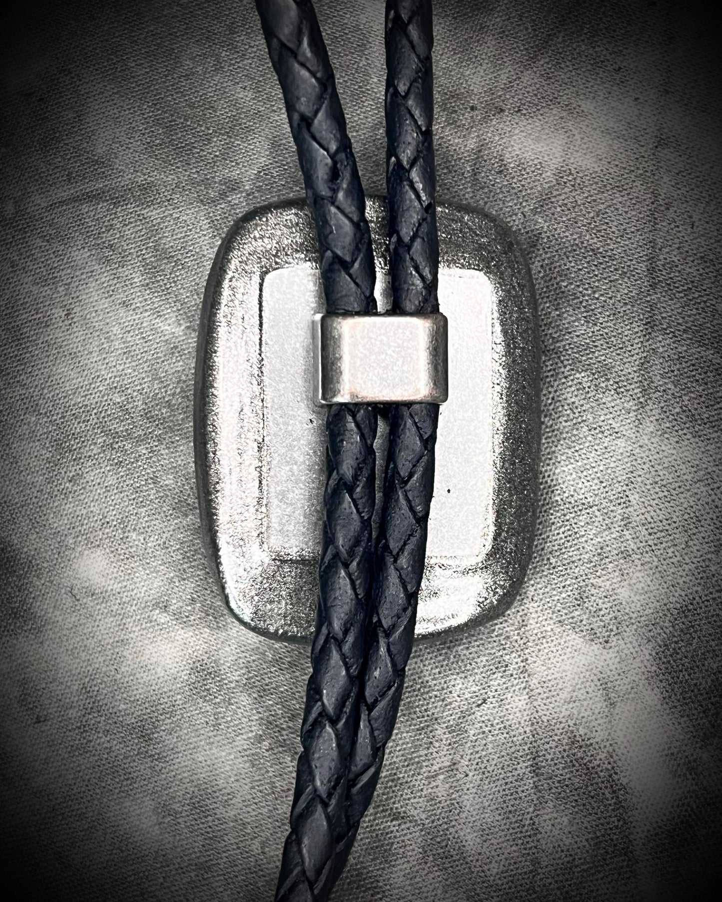 Labradorite Crystal bolo tie jewelry. Trending men’s accessories fall 2025. Statement bolo tie with gemstones. Alternative men’s fashion jewelry. Gender-fluid bolo tie styling. Western-inspired necklace with crystals. Unique leather bolo tie for him or her.