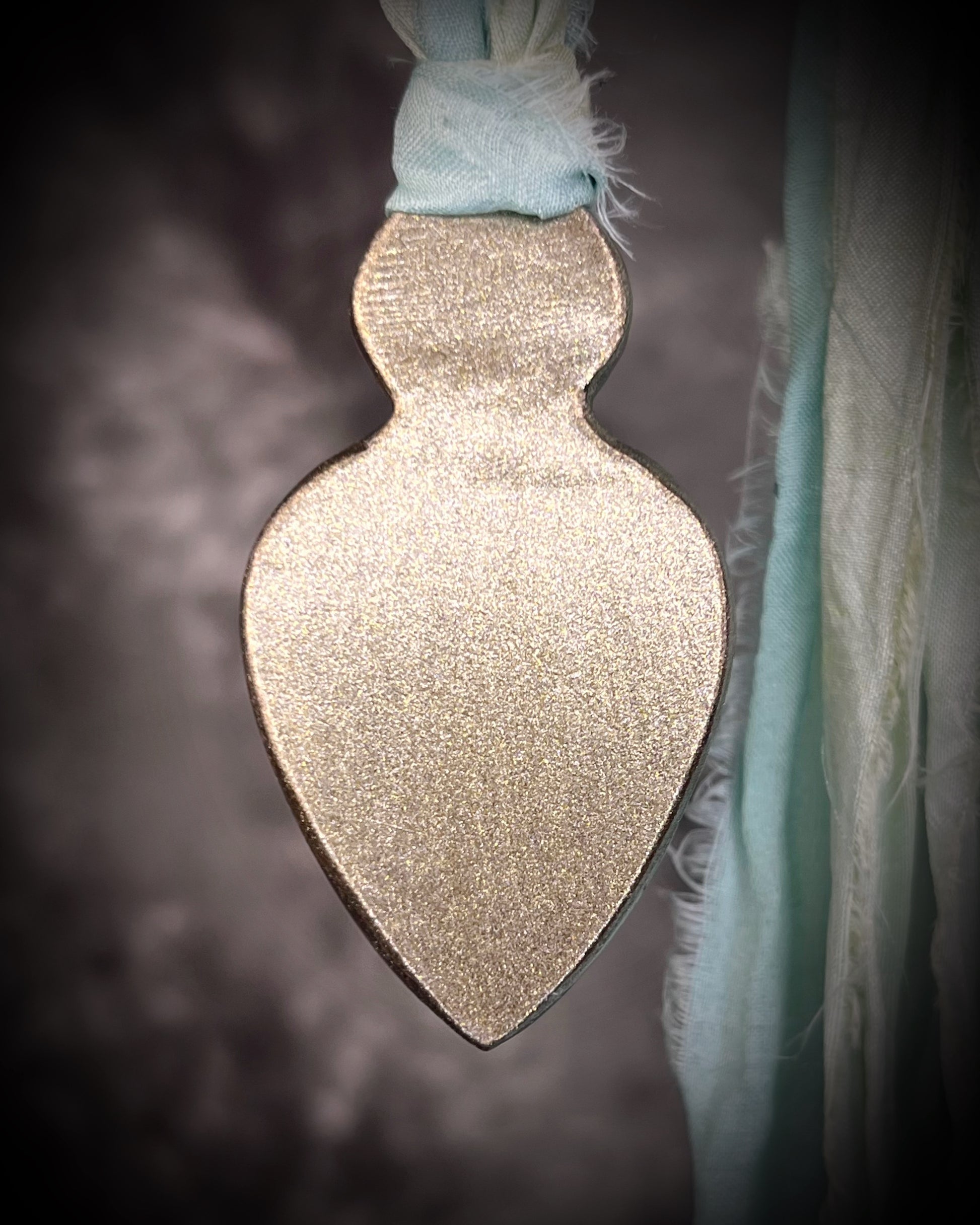 Variscite crystal pendant with green and white stone adorned with a sparkling opal and crafted in a gold frame. Gold necklace hung from soft sea green recycled silk. Boho Spiritual jewelry gift for her. 