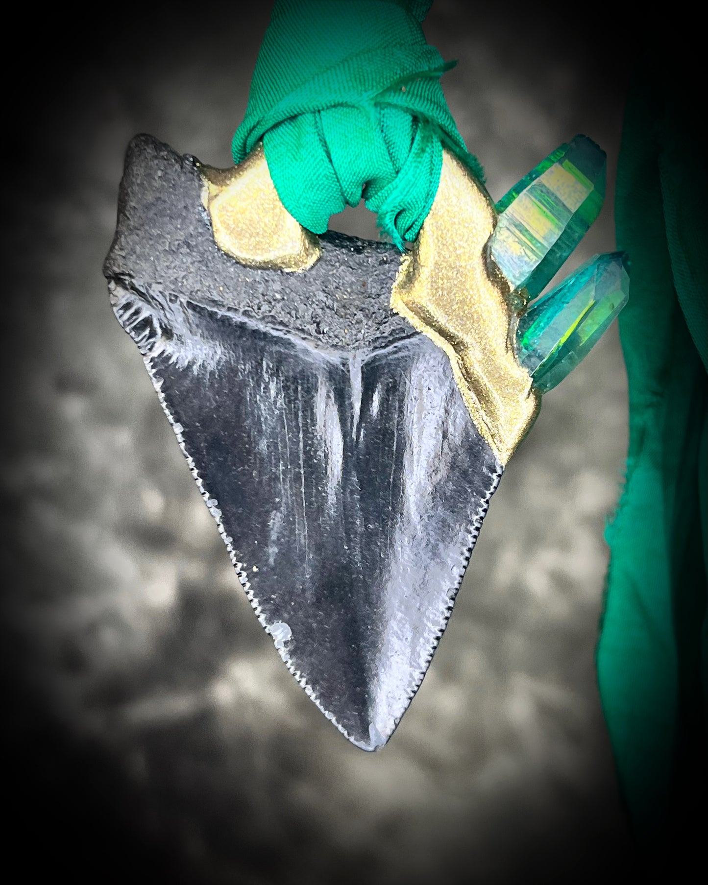 Back view of Ancient megalodon fossil tooth necklace with green aura quartz points, hung from sustainable green recycled silk. Gemstone fantasy jewelry for the wild-hearted and fearless. Handmade jewelry gift for her holiday 2025.