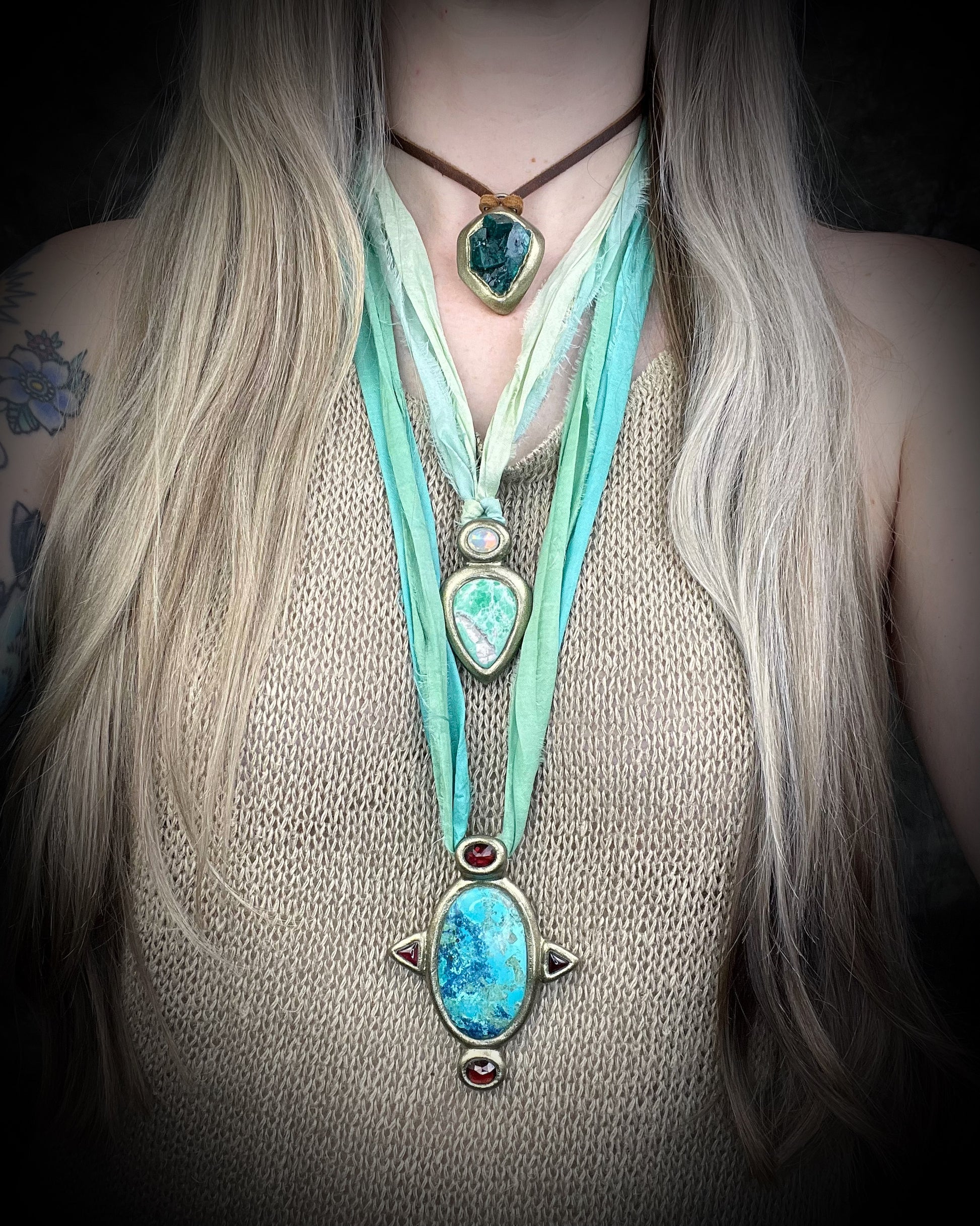 Vivid emerald green chunky dioptase crystal pendant handmade and set in a gold finish, hung from soft brown leather for an earthy, unisex vibe. Jewery for men or gift for her. 
