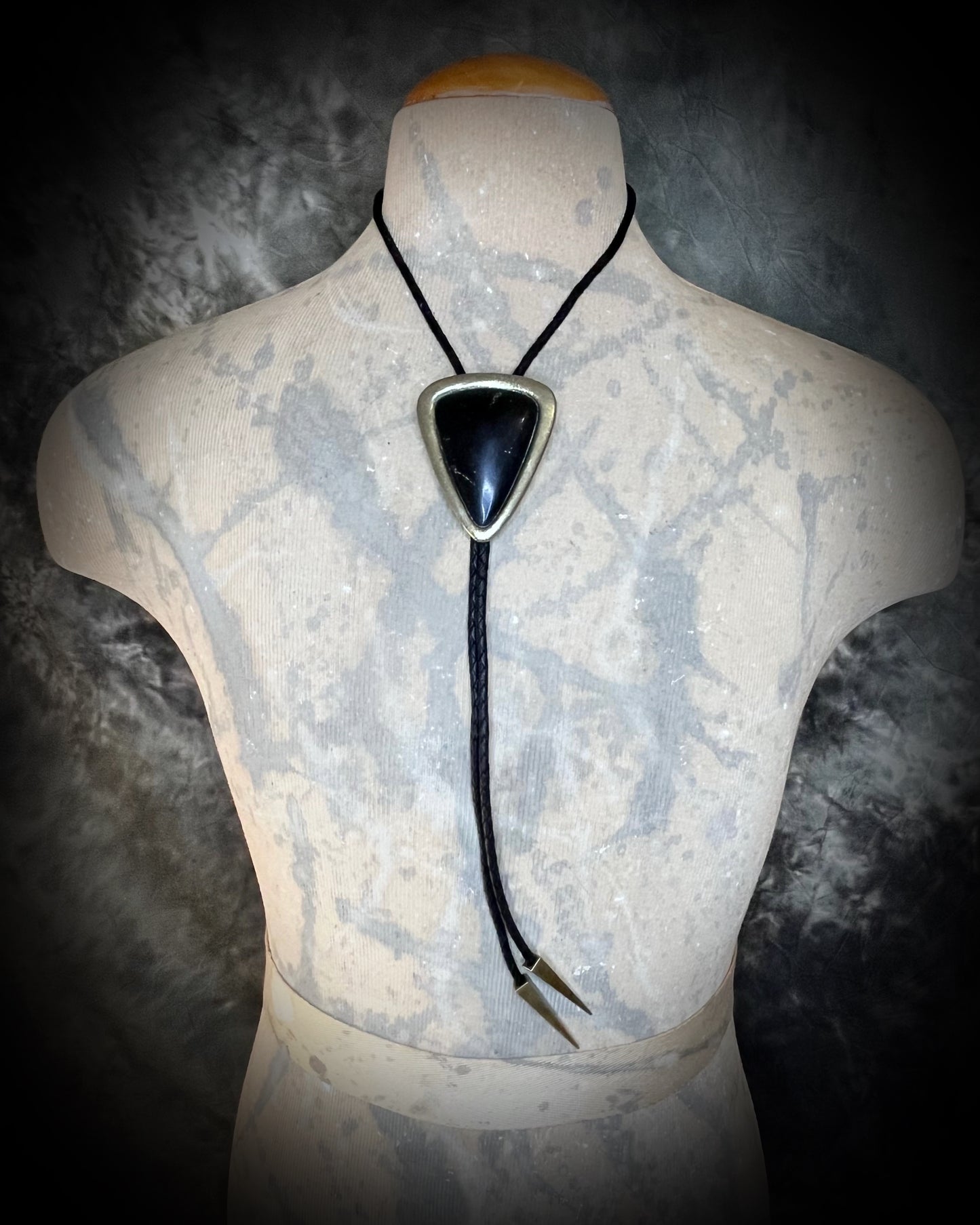 XL Black Tourmaline bolo tie in gold setting on black leather cord