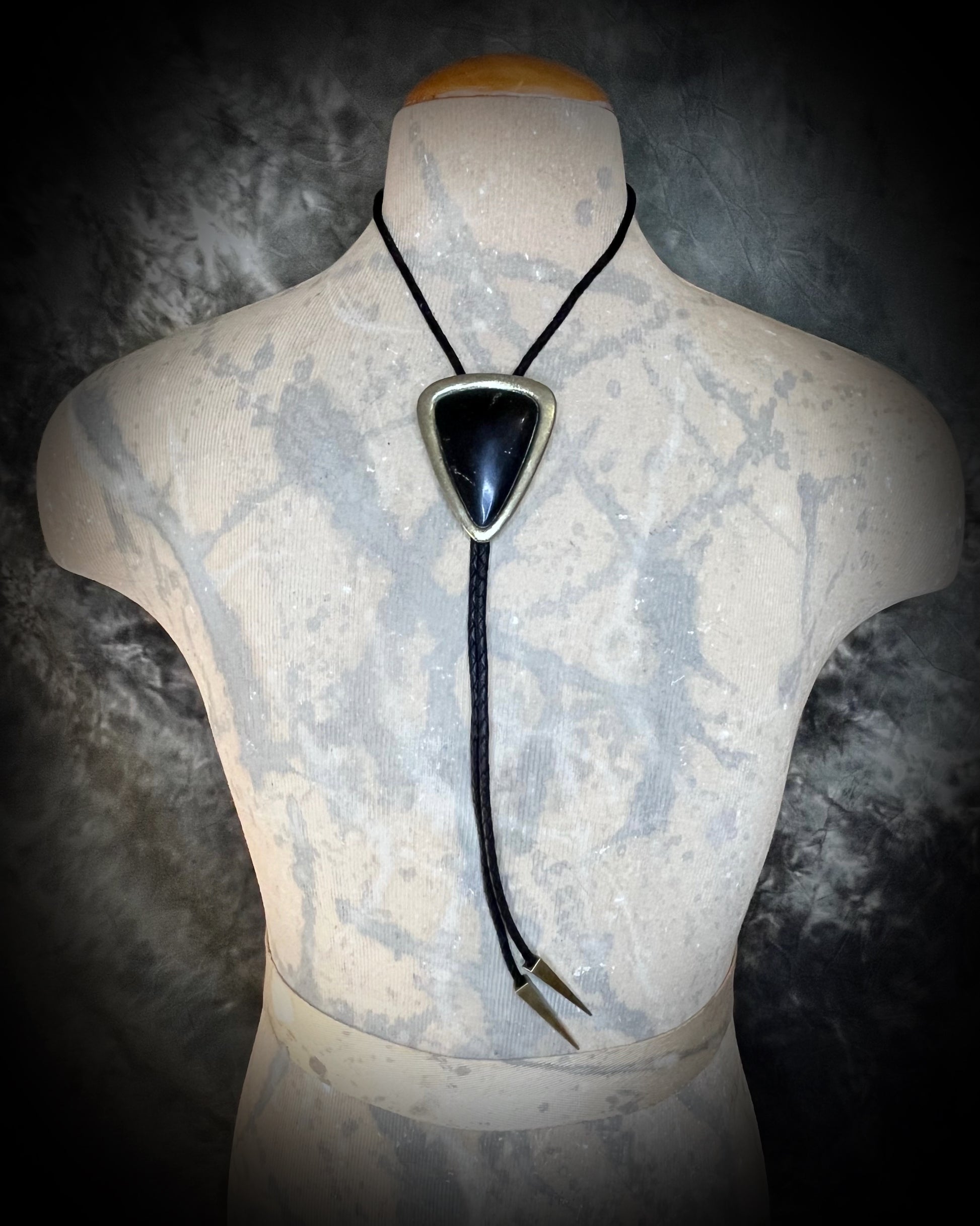 XL Black Tourmaline bolo tie in gold setting on black leather cord