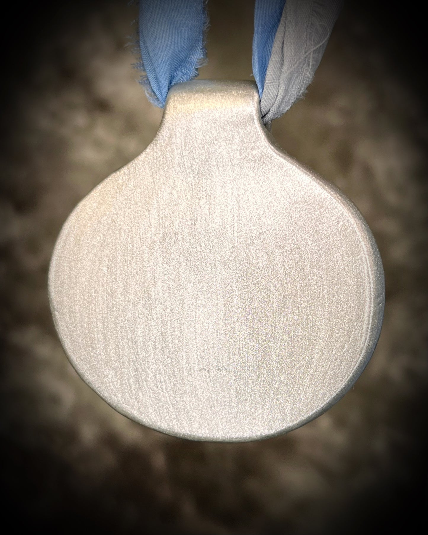 XL rainbow moonstone fire pendant handmade in a silver finish for moon goddess energy. Hung from blue and silver recycled silk for an ethereal and intuitive energy. Spiritual summer jewelry gift for her. 