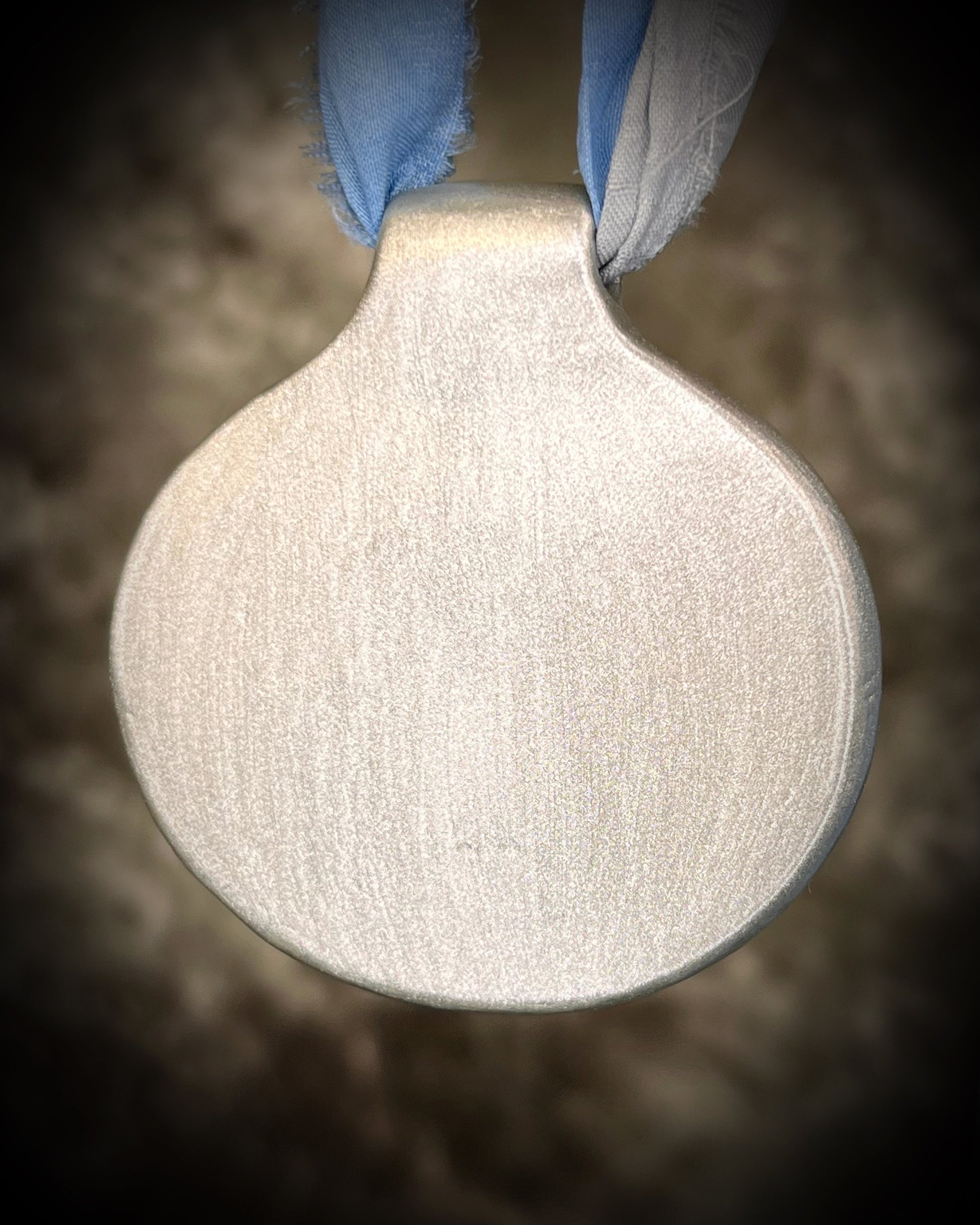 XL rainbow moonstone fire pendant handmade in a silver finish for moon goddess energy. Hung from blue and silver recycled silk for an ethereal and intuitive energy. Spiritual summer jewelry gift for her. 
