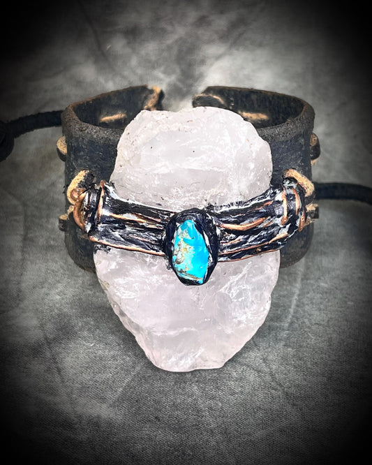  XL stitched leather cuff, handmade with a large raw Rose Quartz crystal paired with a Turquoise accent stone, and a  tie-on leather cord closure for an adjustable, unisex fit.