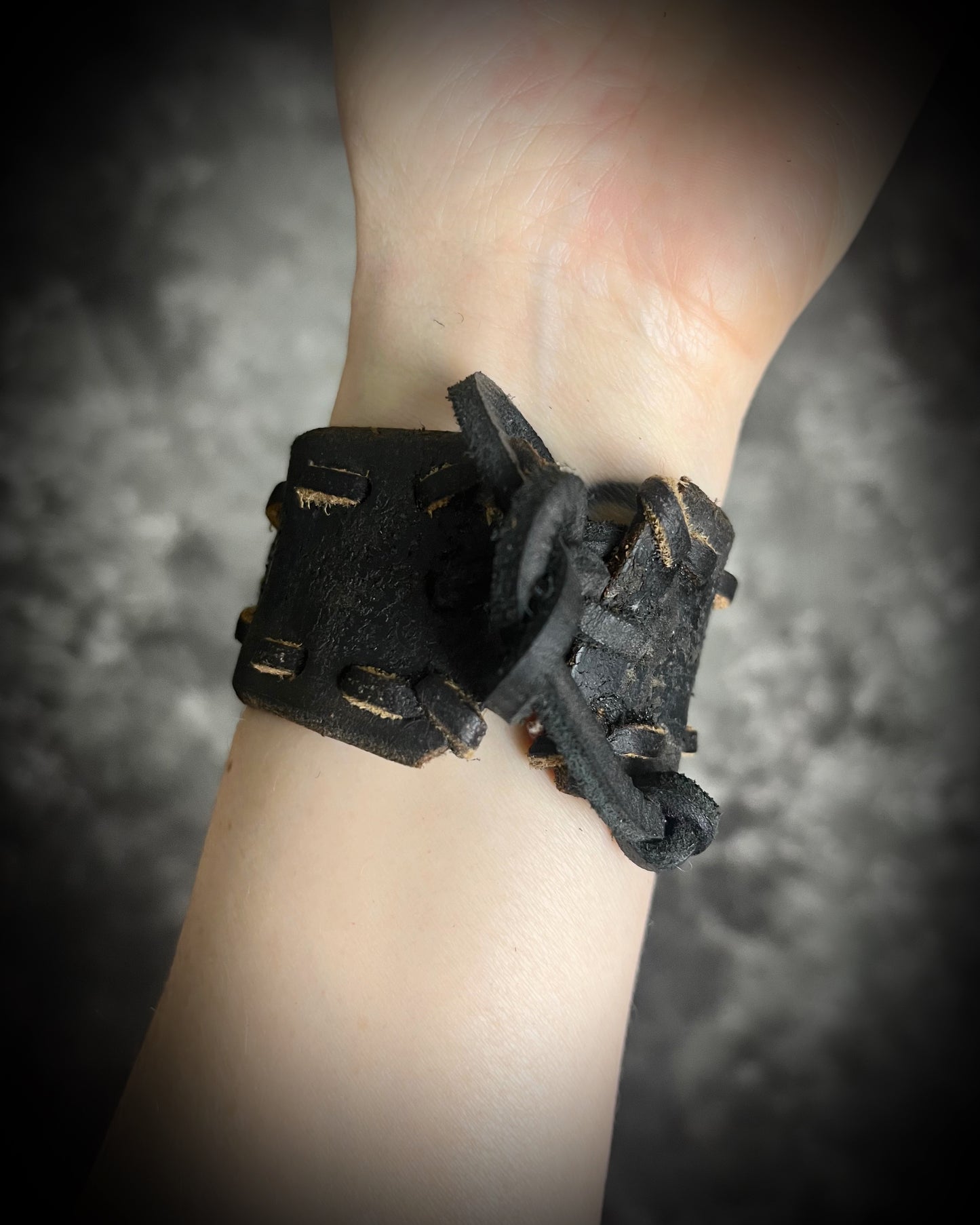  XL stitched leather cuff, handmade with a large raw Rose Quartz crystal paired with a Turquoise accent stone, and a  tie-on leather cord closure for an adjustable, unisex fit.