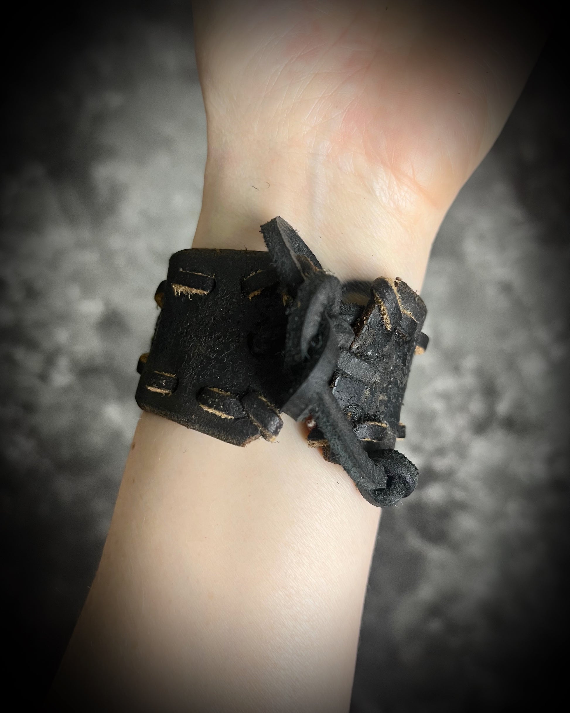  XL stitched leather cuff, handmade with a large raw Rose Quartz crystal paired with a Turquoise accent stone, and a  tie-on leather cord closure for an adjustable, unisex fit.