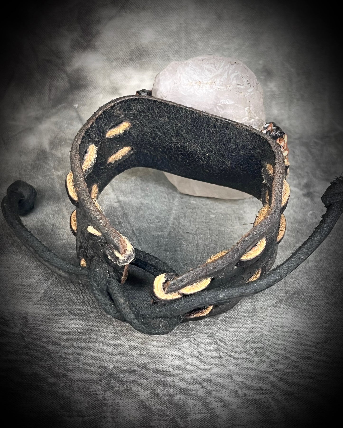  XL stitched leather cuff, handmade with a large raw Rose Quartz crystal paired with a Turquoise accent stone, and a  tie-on leather cord closure for an adjustable, unisex fit.