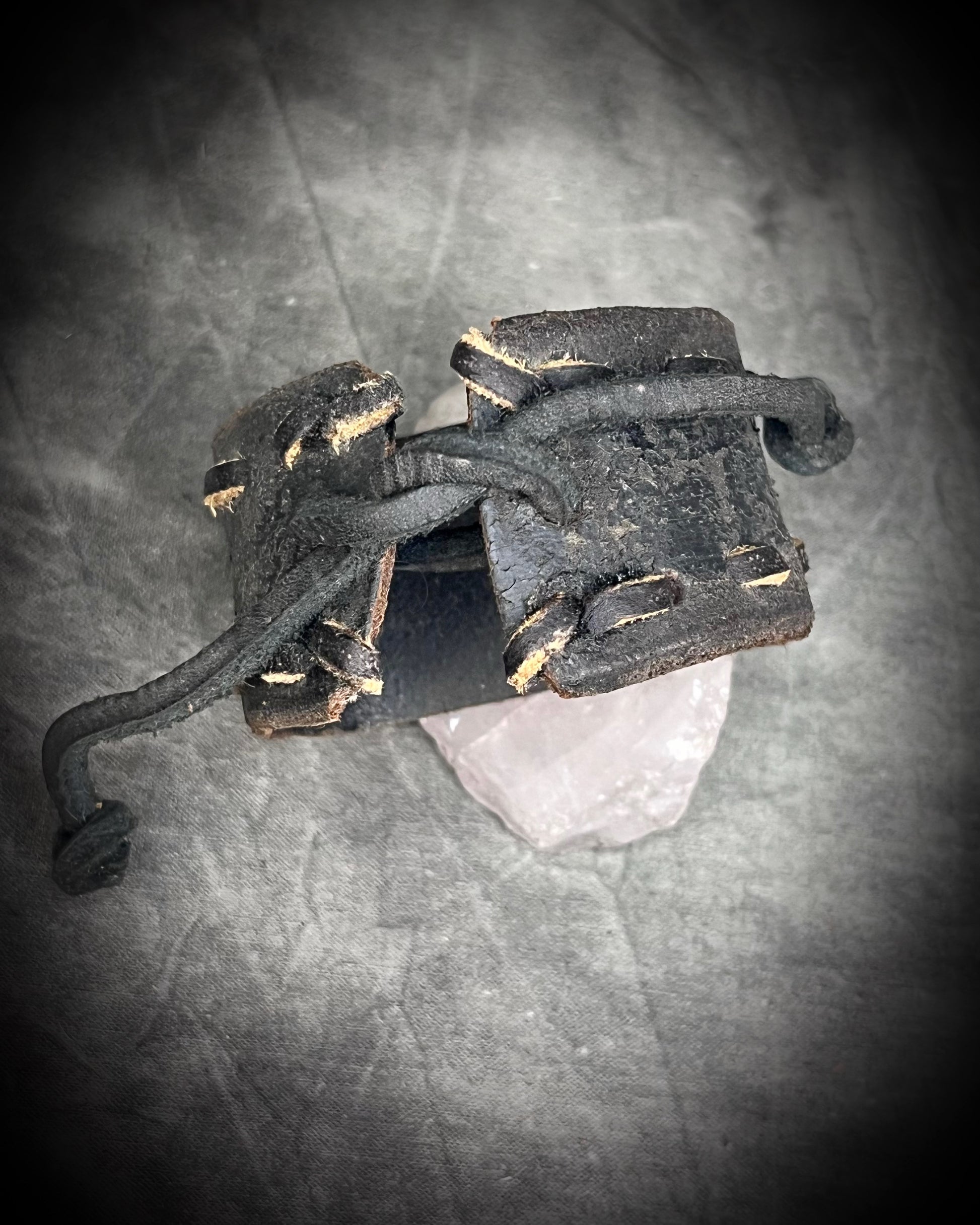  XL stitched leather cuff, handmade with a large raw Rose Quartz crystal paired with a Turquoise accent stone, and a  tie-on leather cord closure for an adjustable, unisex fit.