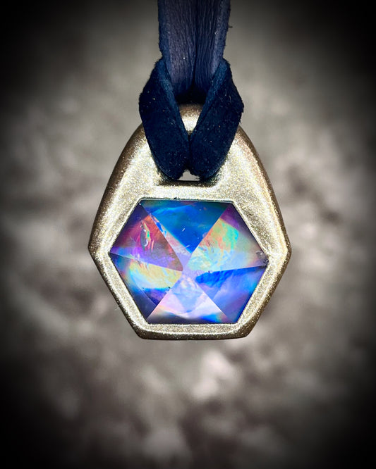 Hexagonal pendant with iridescent rainbow quartz gemstone.  Gold handmade necklace on black leather, fall 2025 gift for her. 