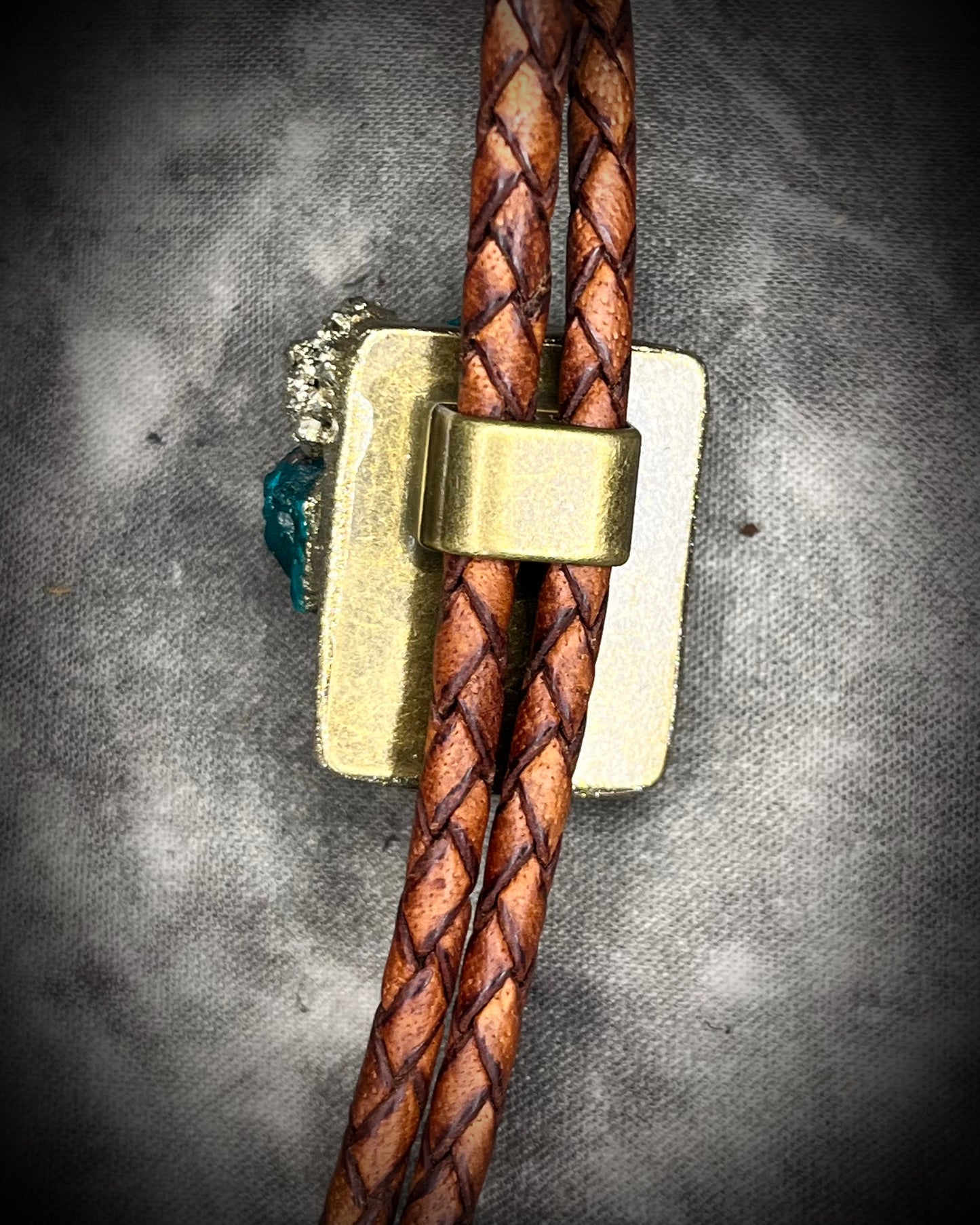 Dioptase and Pyrite bolo tie on brown leather – unique handmade bolo necklace, artisan gemstone bolo tie jewelry, mystical men’s bolo for bold style.