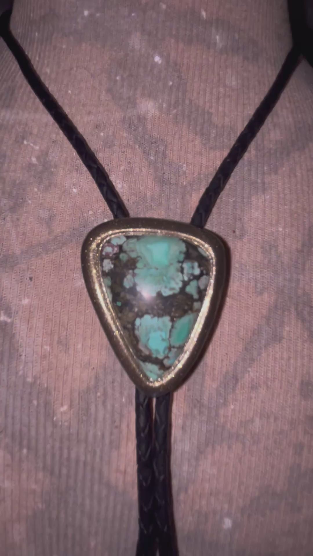 Turquoise handmade bolo tie for him with gold finish on black leather. Boho western bolo tie necklace for spiritual rebels.