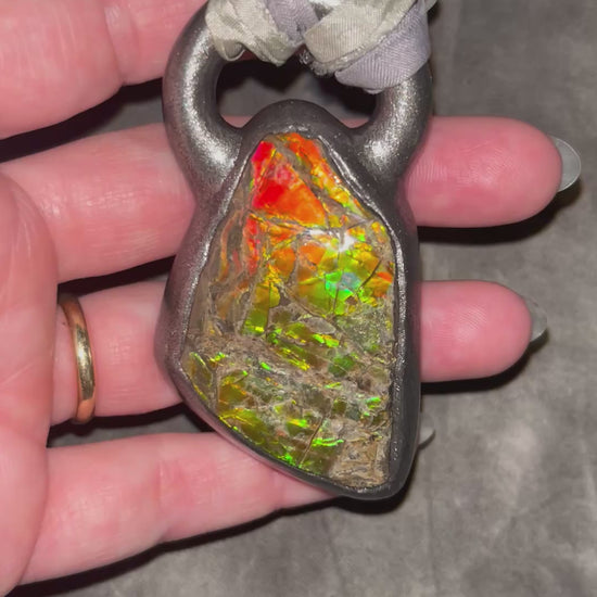 Ammolite pendant on silver recycled silks in a gunmetal silver finish.  Handmade ammolite jewelry gift for her.  