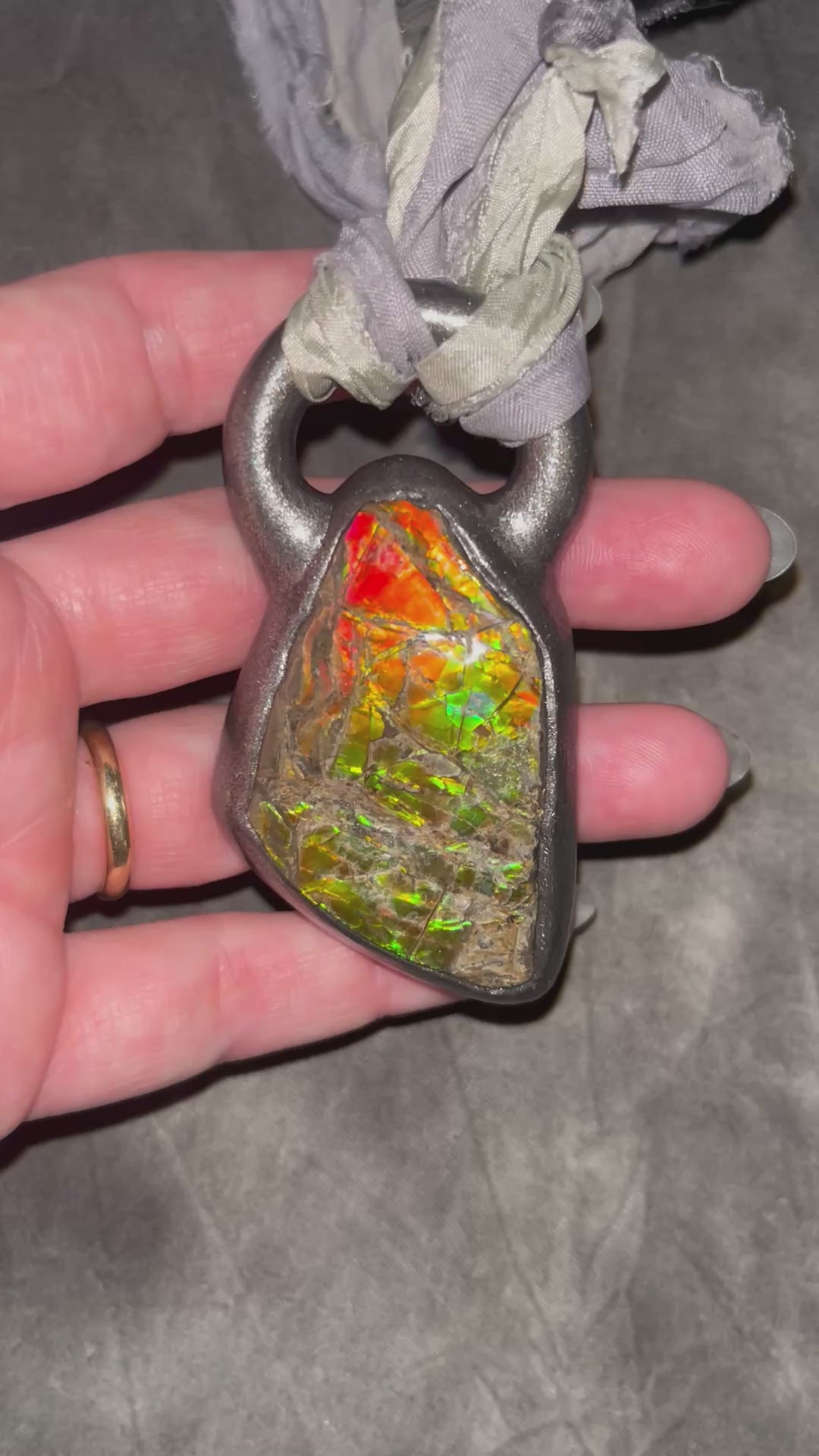 Ammolite pendant on silver recycled silks in a gunmetal silver finish.  Handmade ammolite jewelry gift for her.  
