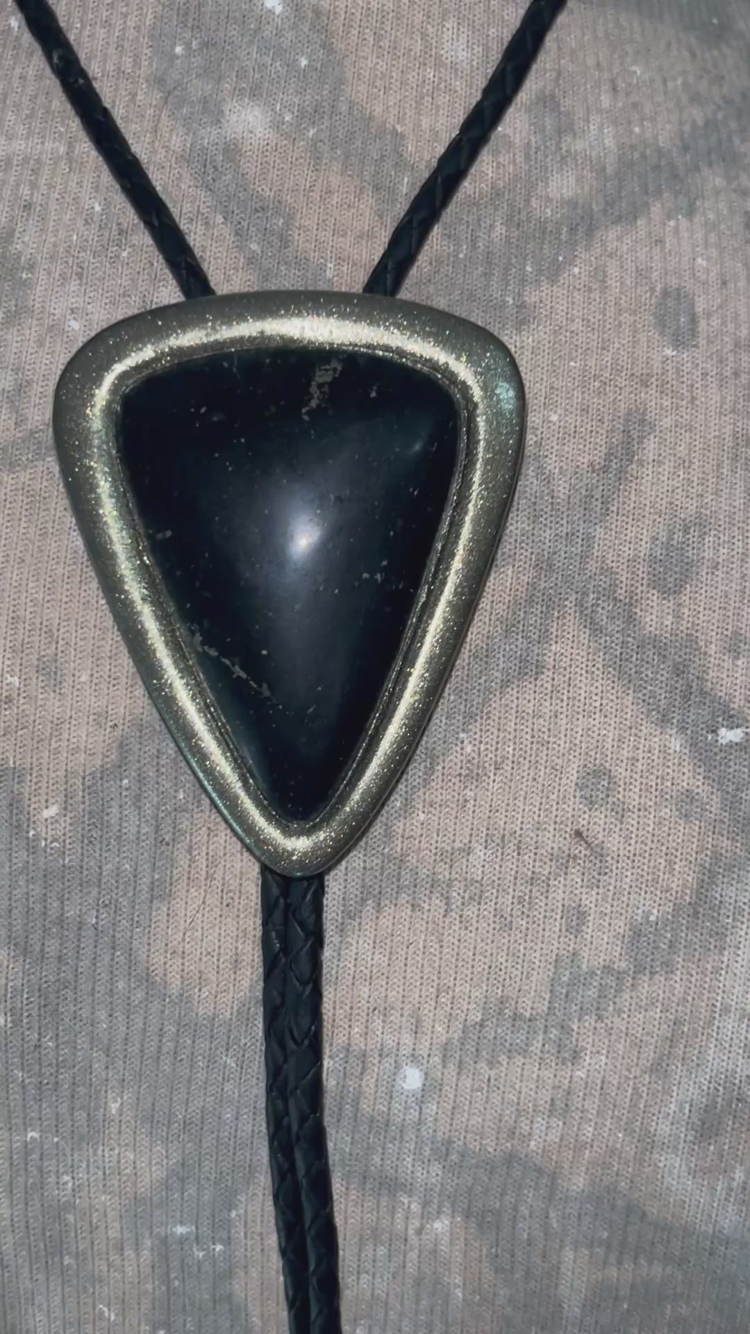 XL Black Tourmaline bolo tie in gold setting on black leather cord