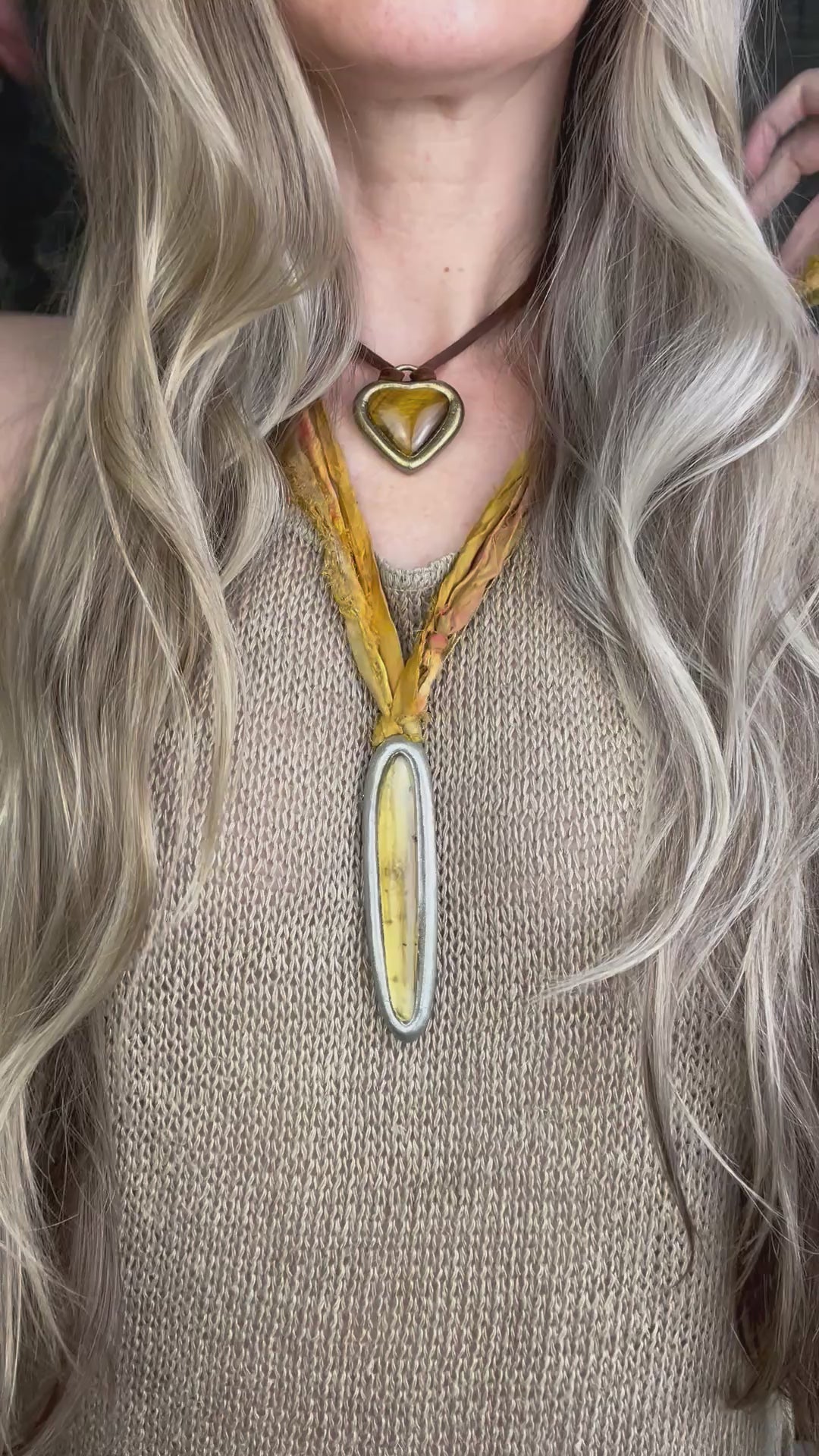  Video of ancient insect included amber pendant in silver finish on marigold and yellow recycled silks. Enchanting natural history holiday gift for her! 