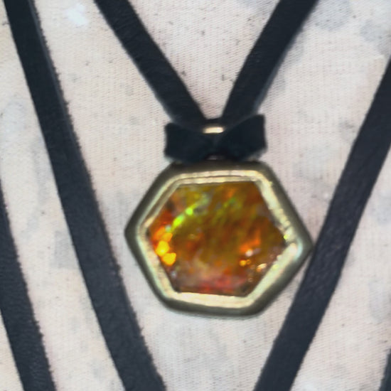 Fiery citrine and soothing amethyst hexagon crystal pendant with opalescent flash in gold finish on black leather cord — handcrafted statement talisman
