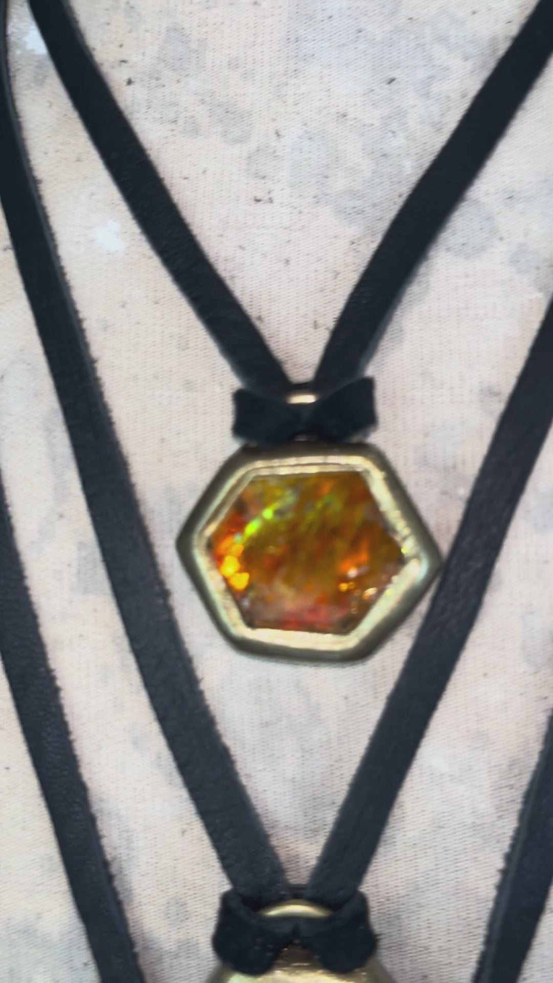 Fiery citrine and soothing amethyst hexagon crystal pendant with opalescent flash in gold finish on black leather cord — handcrafted statement talisman