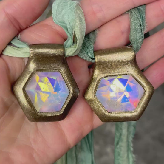 Hexagonal gold pendants on aqua recycled silks in a gold finish. Quartz crystal glowing opalescent beachy pendant. Summer jewelry gift for her. 