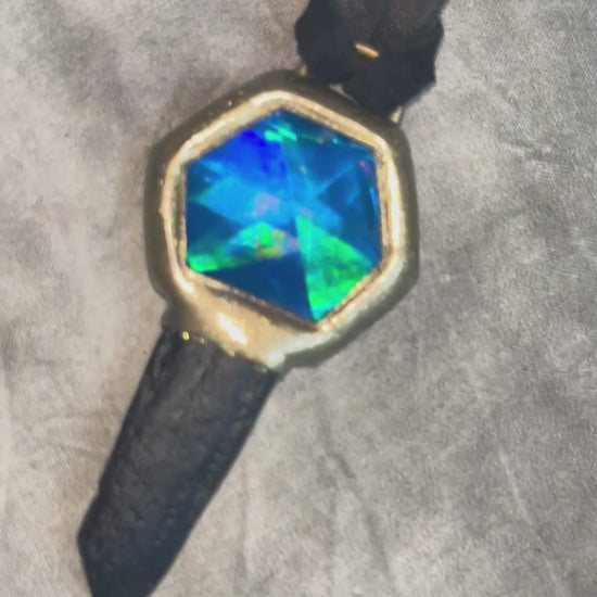 Indochinite tektite and quartz crystal talisman on leather, handmade in Baltimore, Maryland by Become Spellbound.