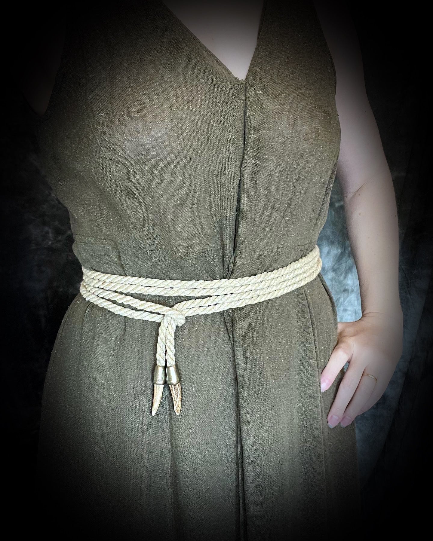 Versatile beige rope accessory for everyday, festival, cosplay or renaissance festival, adorned with two antler tips. Wear as a belt, necklace, hat band or head wrap, decoration, bondage rope or harness.